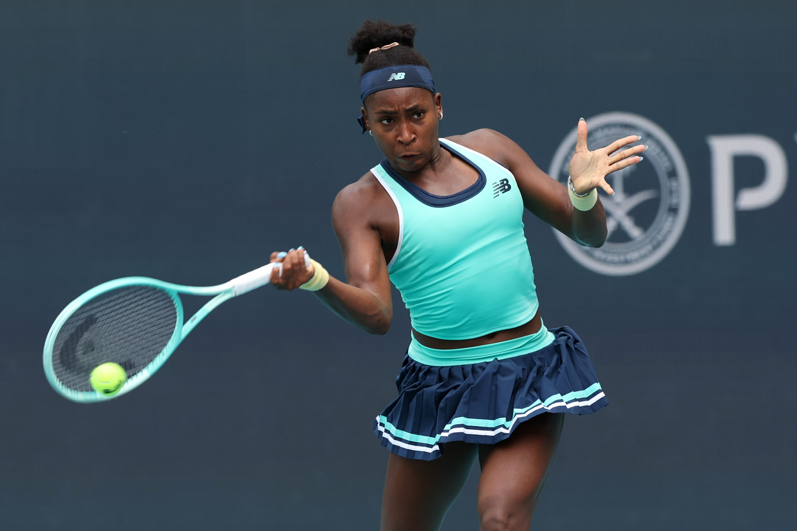 Mar 22, 2025; Miami, FL, USA; Coco Gauff (USA) hits a forehand against Maria Sakkari (GRE)(not pictured) on day five of the Miami Open at Hard Rock Stadium. Mandatory Credit: Geoff Burke-Imagn Images
