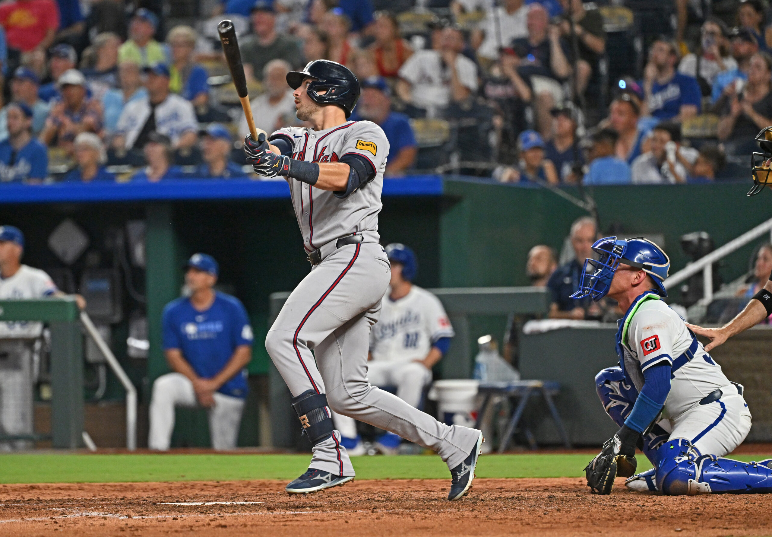 Jul 28, 2025; Kansas City, Missouri, USA;  Atlanta Braves third baseman Austin Riley (27) hits a solo home run in the seventh inning against the Kansas City Royals at Kauffman Stadium. Mandatory Credit: Peter Aiken-Imagn Images