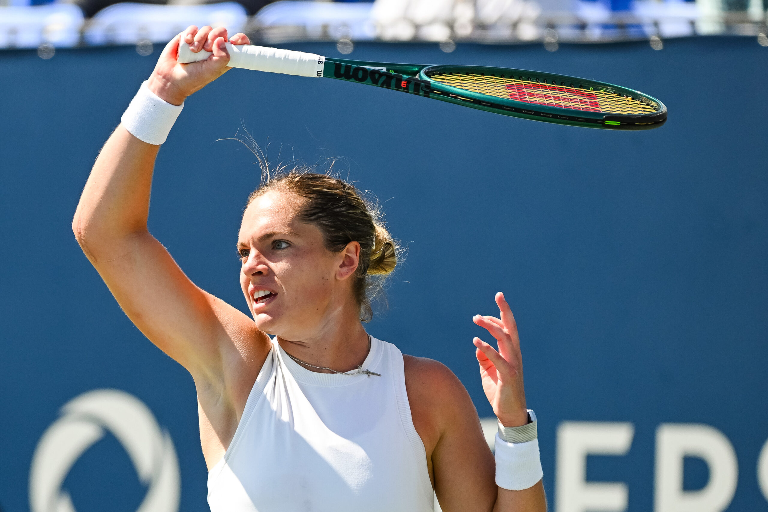 Aug 1, 2025; Montreal, QC, Canada; Caty Mcnally (USA) returns the ball to Madison Keys (USA) in third round play at IGA Stadium. Mandatory Credit: David Kirouac-Imagn Images
