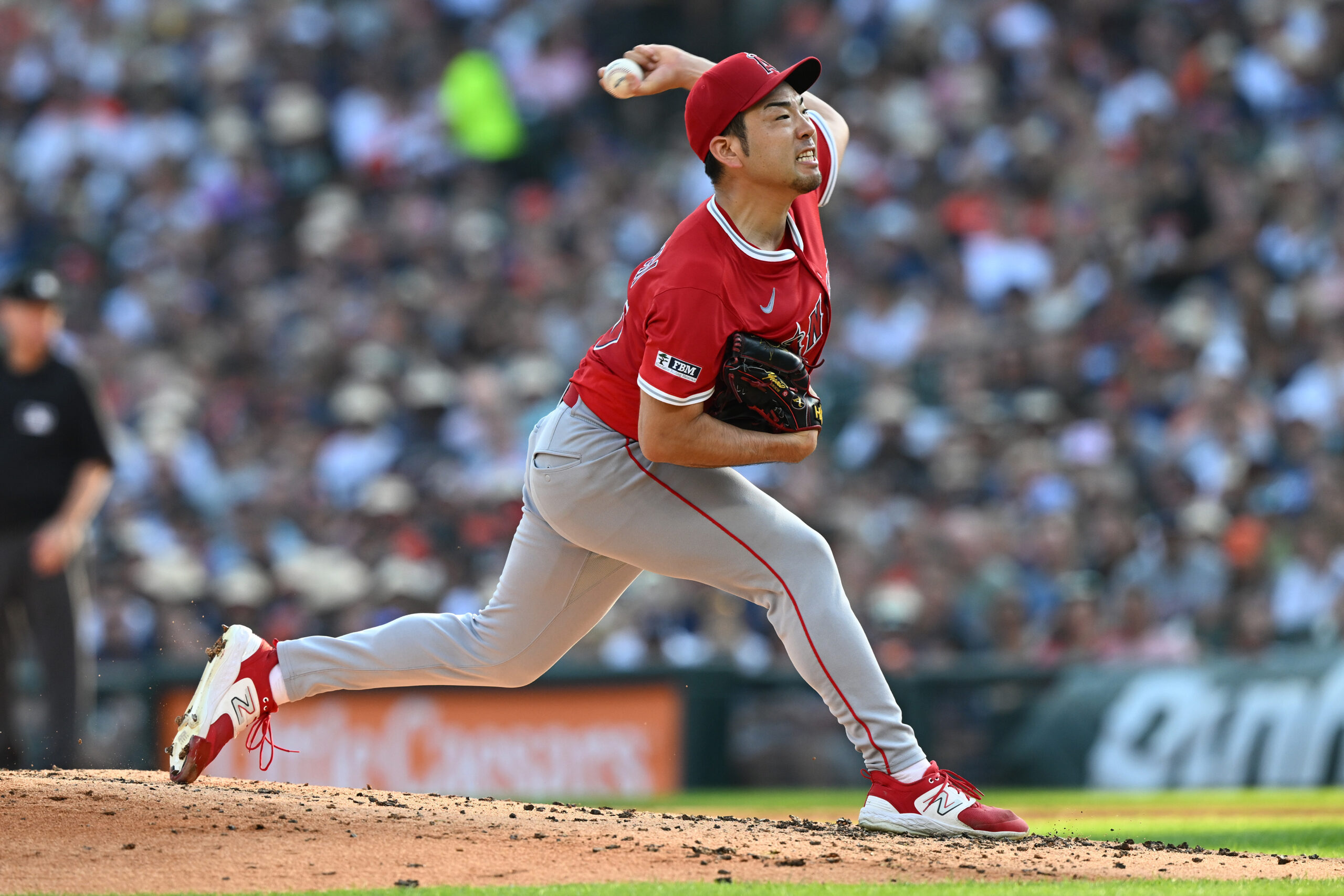 Aug 9, 2025; Detroit, Michigan, USA;  Los Angeles Angels starting pitcher Yusei Kikuchi (16) throws a pitch against the Detroit Tigers in the second  inning at Comerica Park. Mandatory Credit: Lon Horwedel-Imagn Images