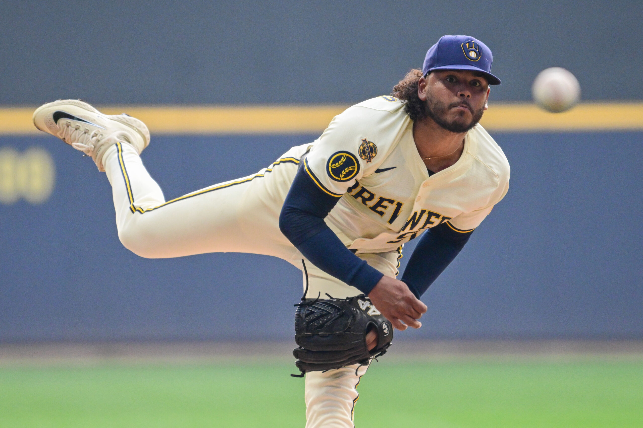 Aug 12, 2025; Milwaukee, Wisconsin, USA; Milwaukee Brewers starting pitcher Freddy Peralta (51) throws a pitch in the first inning against the Pittsburgh Pirates at American Family Field. Mandatory Credit: Benny Sieu-Imagn Images