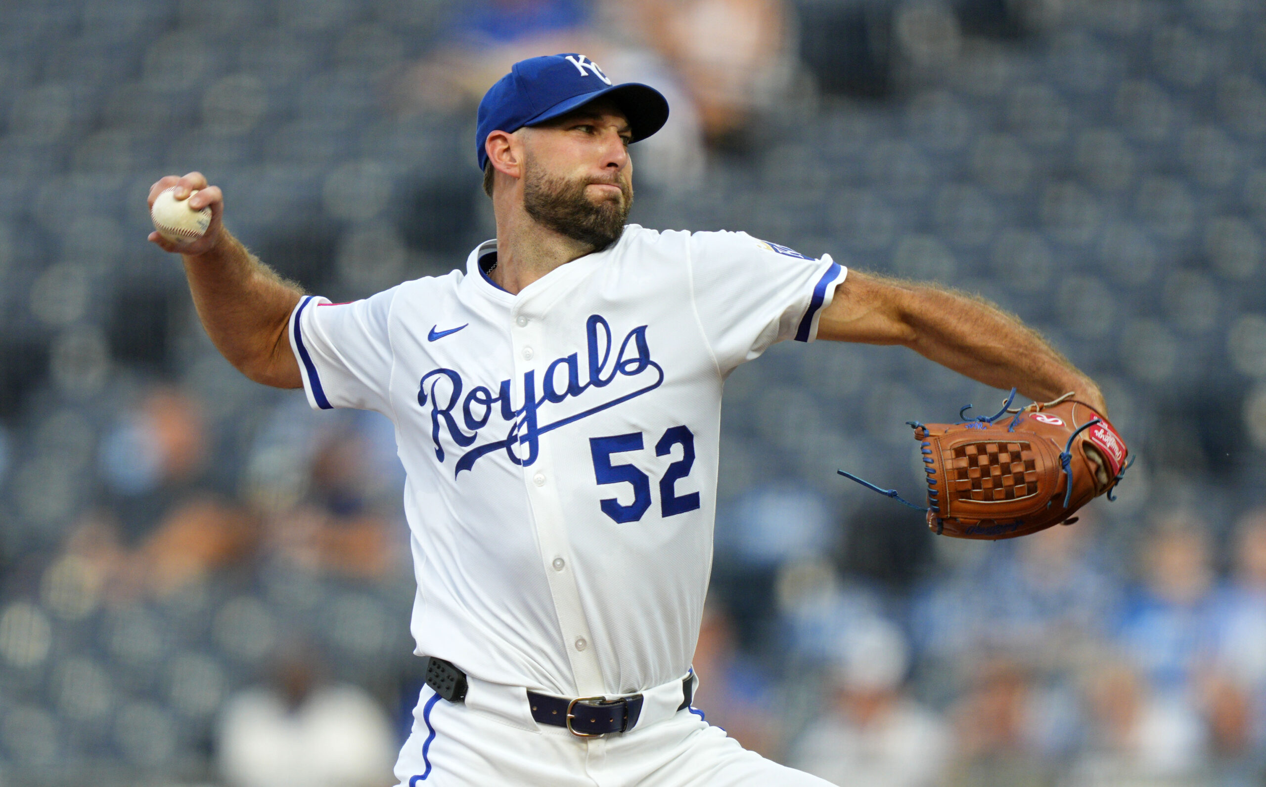 Aug 18, 2025; Kansas City, Missouri, USA; Kansas City Royals starting pitcher Michael Wacha (52) pitches during the first inning against the Texas Rangers at Kauffman Stadium. Mandatory Credit: Jay Biggerstaff-Imagn Images