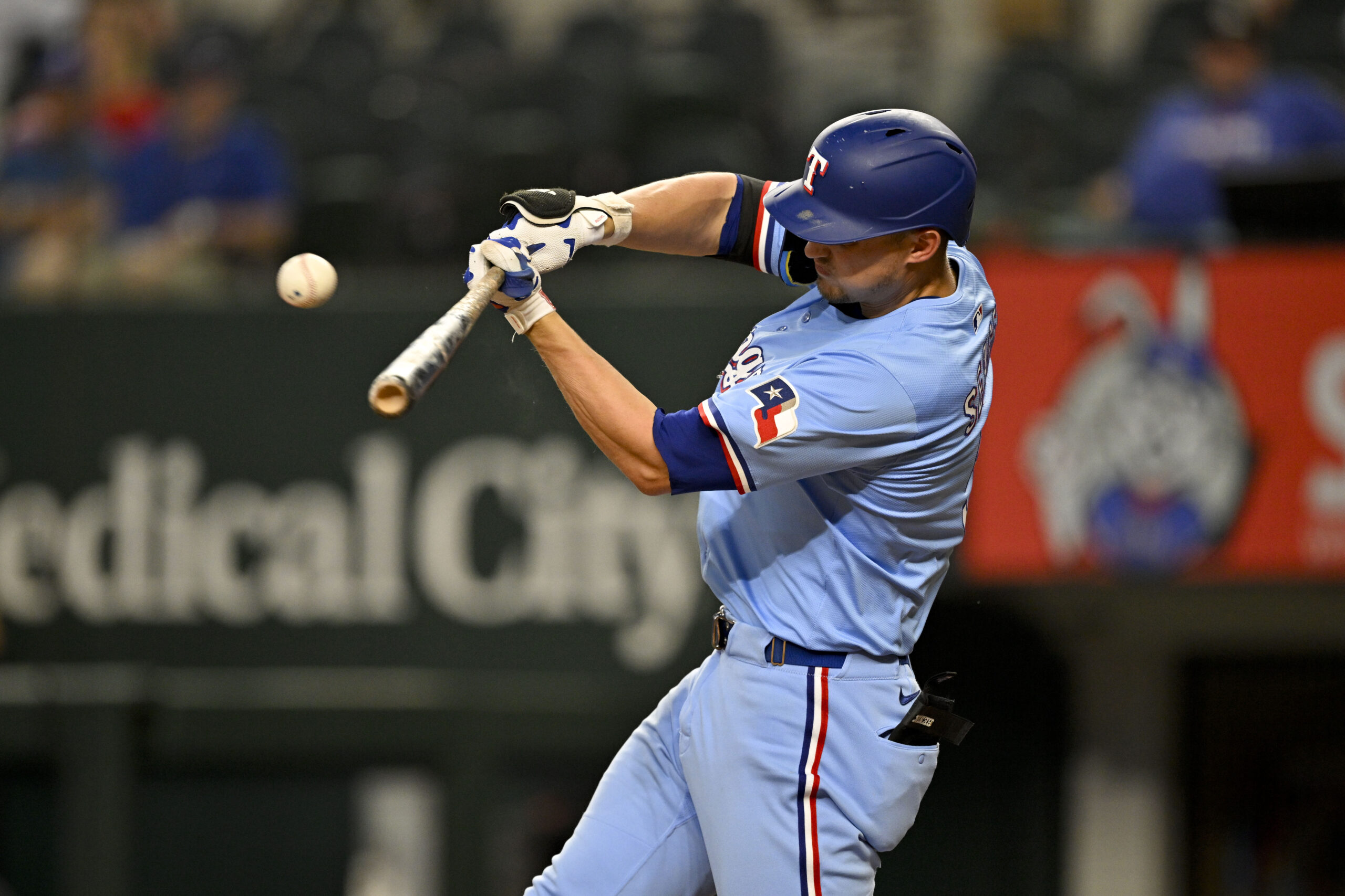 Aug 24, 2025; Arlington, Texas, USA; Texas Rangers shortstop Corey Seager (5) hits a single against the Cleveland Guardians during the eighth inning at Globe Life Field. Mandatory Credit: Jerome Miron-Imagn Images