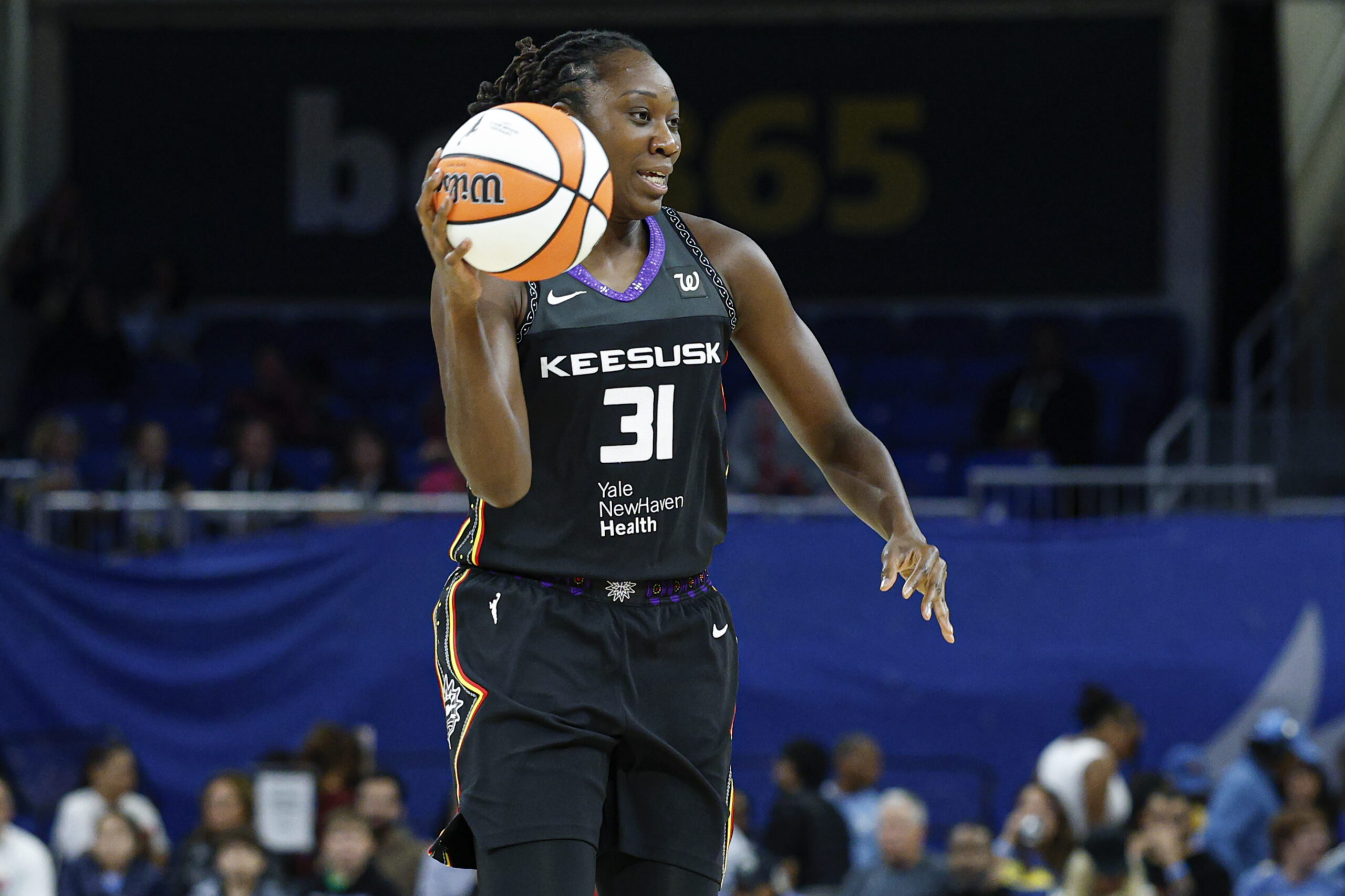 Sep 3, 2025; Chicago, Illinois, USA; Connecticut Sun center Tina Charles (31) looks to pass the ball against the Chicago Sky during the first half at Wintrust Arena. Mandatory Credit: Kamil Krzaczynski-Imagn Images