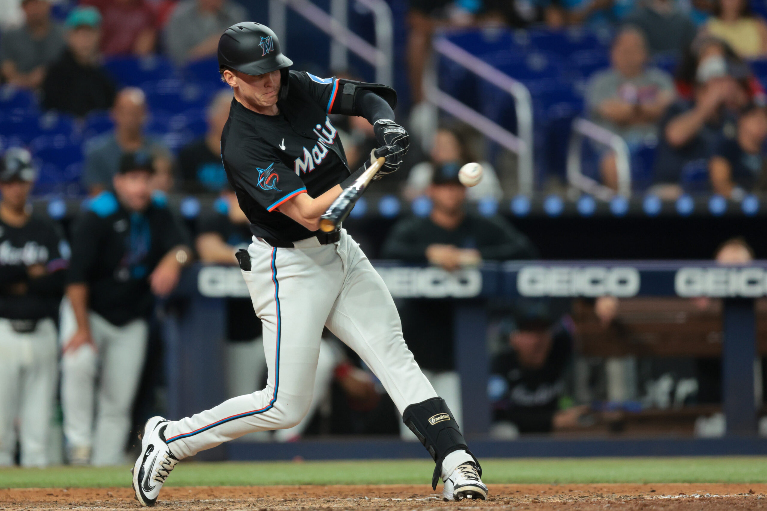 Sep 5, 2025; Miami, Florida, USA; Miami Marlins shortstop Jack Winkler (63) hits a double against the Philadelphia Phillies during the eighth inning at loanDepot Park. Mandatory Credit: Sam Navarro-Imagn Images