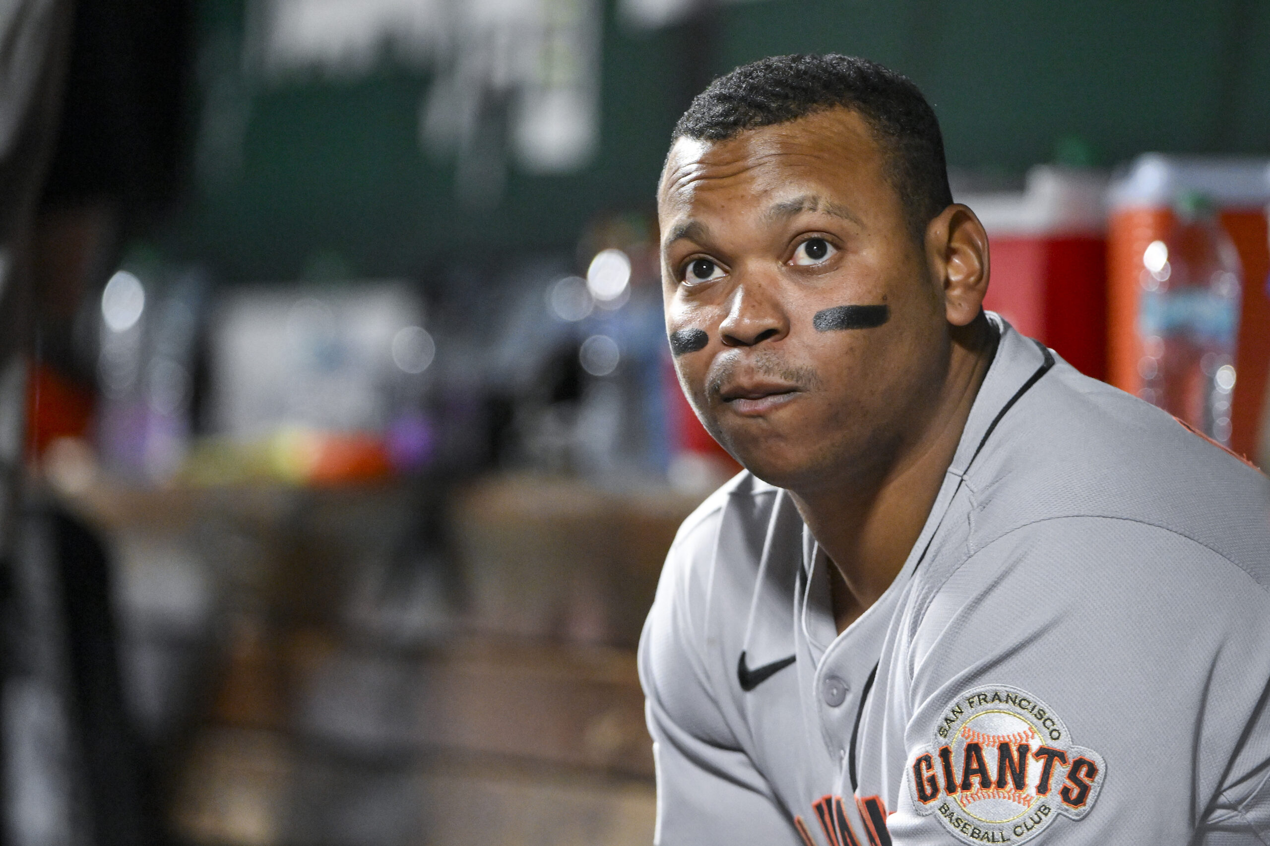 Sep 5, 2025; St. Louis, Missouri, USA; San Francisco Giants designated hitter Rafael Devers (16) looks on from the dugout during the seventh inning against the St. Louis Cardinals at Busch Stadium. Mandatory Credit: Jeff Curry-Imagn Images