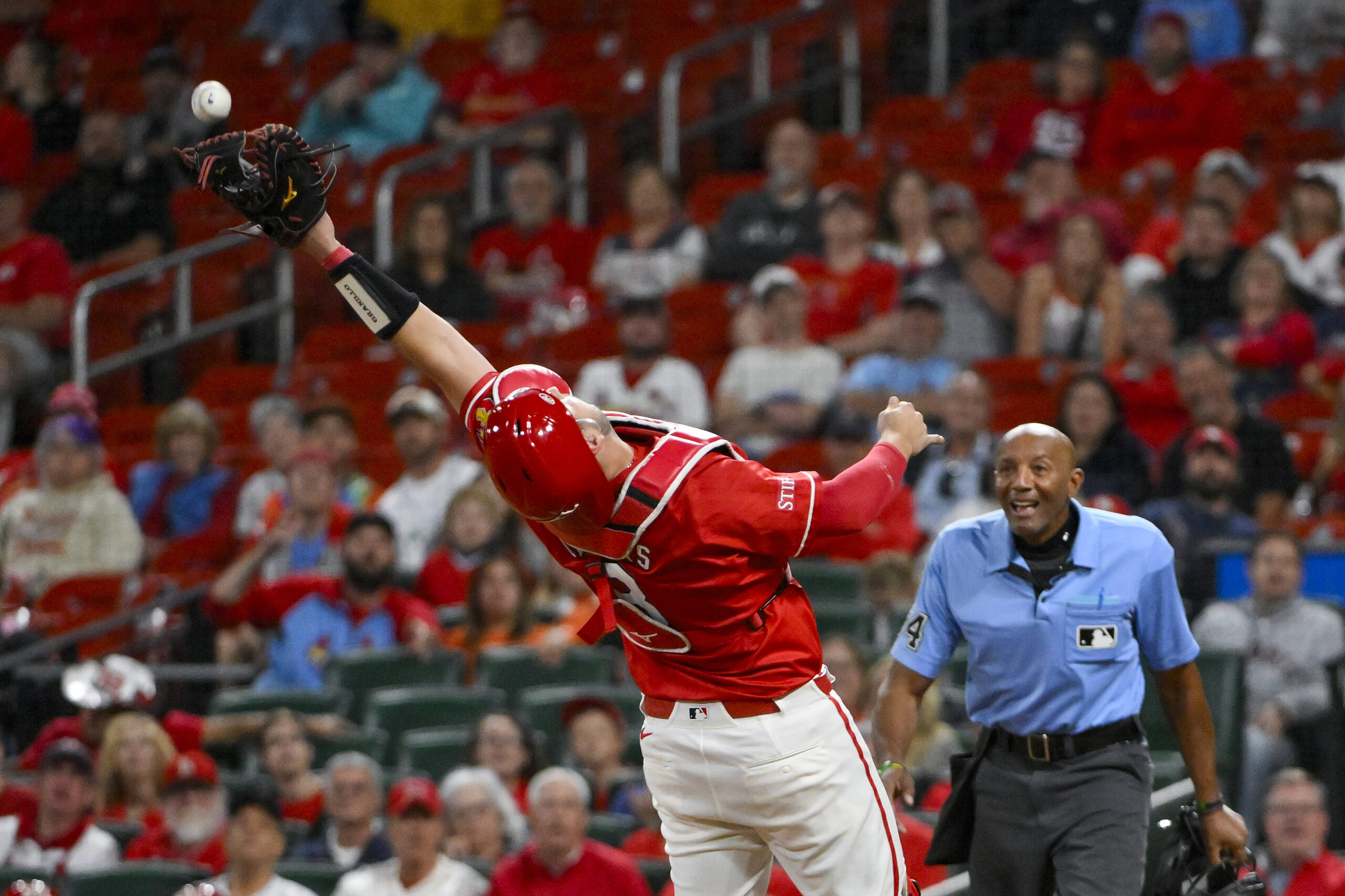Sep 5, 2025; St. Louis, Missouri, USA;  St. Louis Cardinals catcher Jimmy Crooks (8) catches a pop up hit by San Francisco Giants left fielder Heliot Ramos (not pictured) during the ninth inning at Busch Stadium. Mandatory Credit: Jeff Curry-Imagn Images