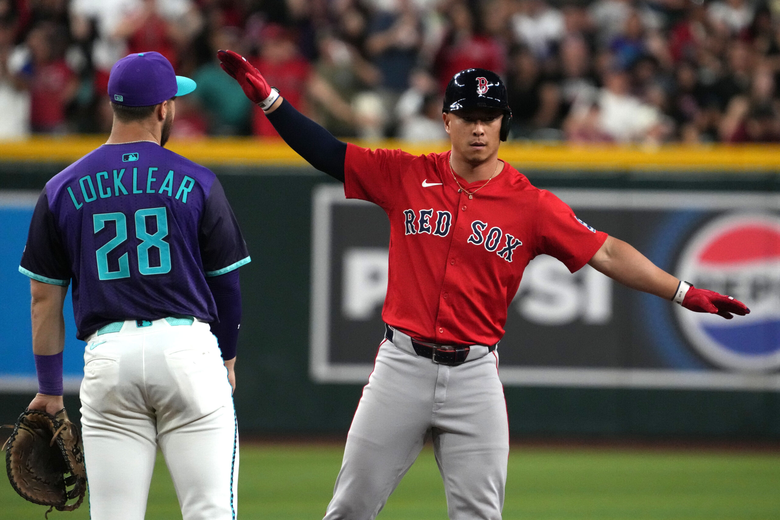 Sep 5, 2025; Phoenix, Arizona, USA; Boston Red Sox outfielder Rob Refsnyder (30) reacts after hitting an RBI double against the Arizona Diamondbacks in the eighth inning at Chase Field. Mandatory Credit: Rick Scuteri-Imagn Images