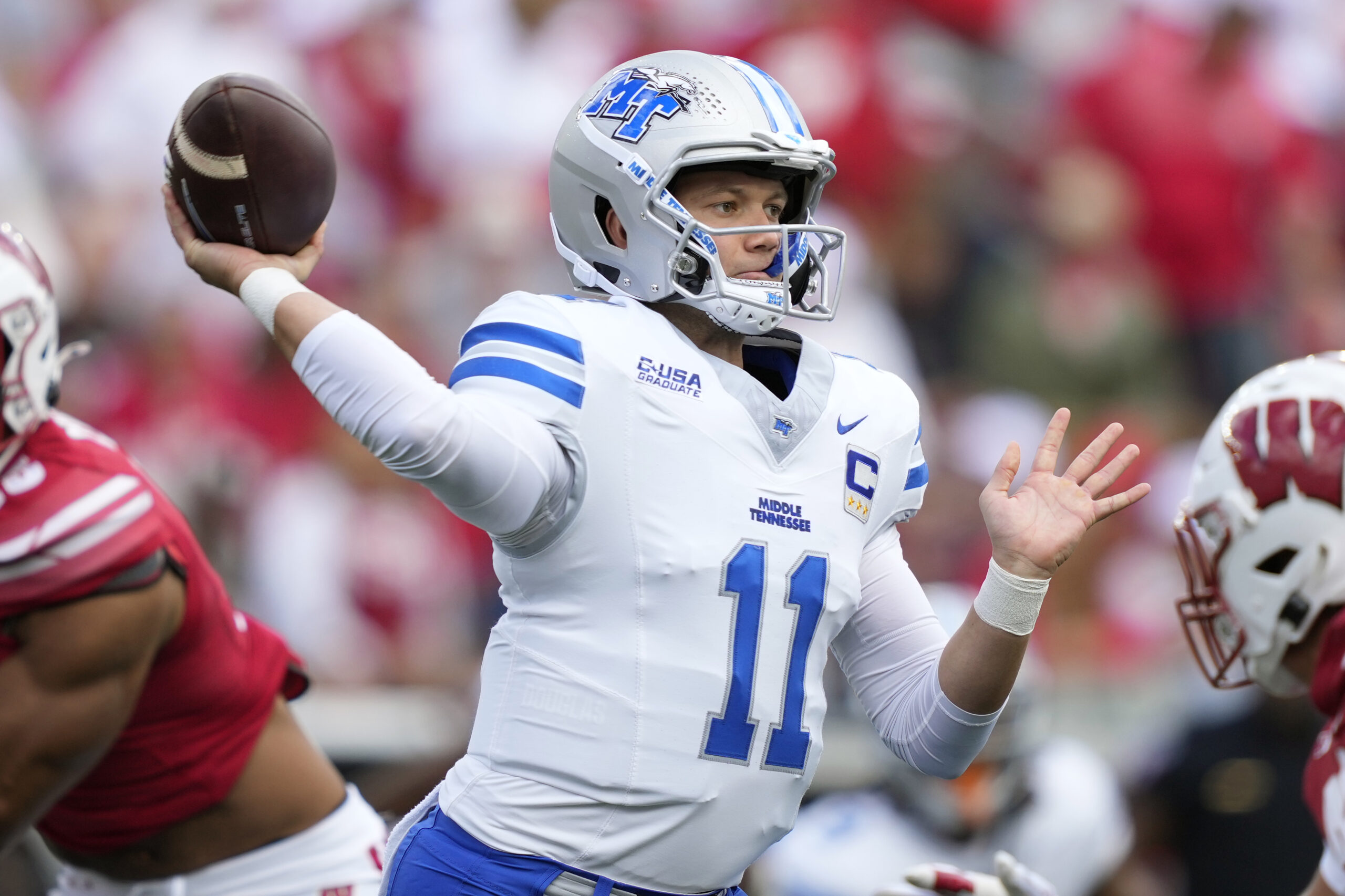 Sep 6, 2025; Madison, Wisconsin, USA; Middle Tennessee Blue Raiders quarterback Nicholas Vattiato (11) throws a pass during the first quarter against the Wisconsin Badgers at Camp Randall Stadium. Mandatory Credit: Kayla Wolf-Imagn Images