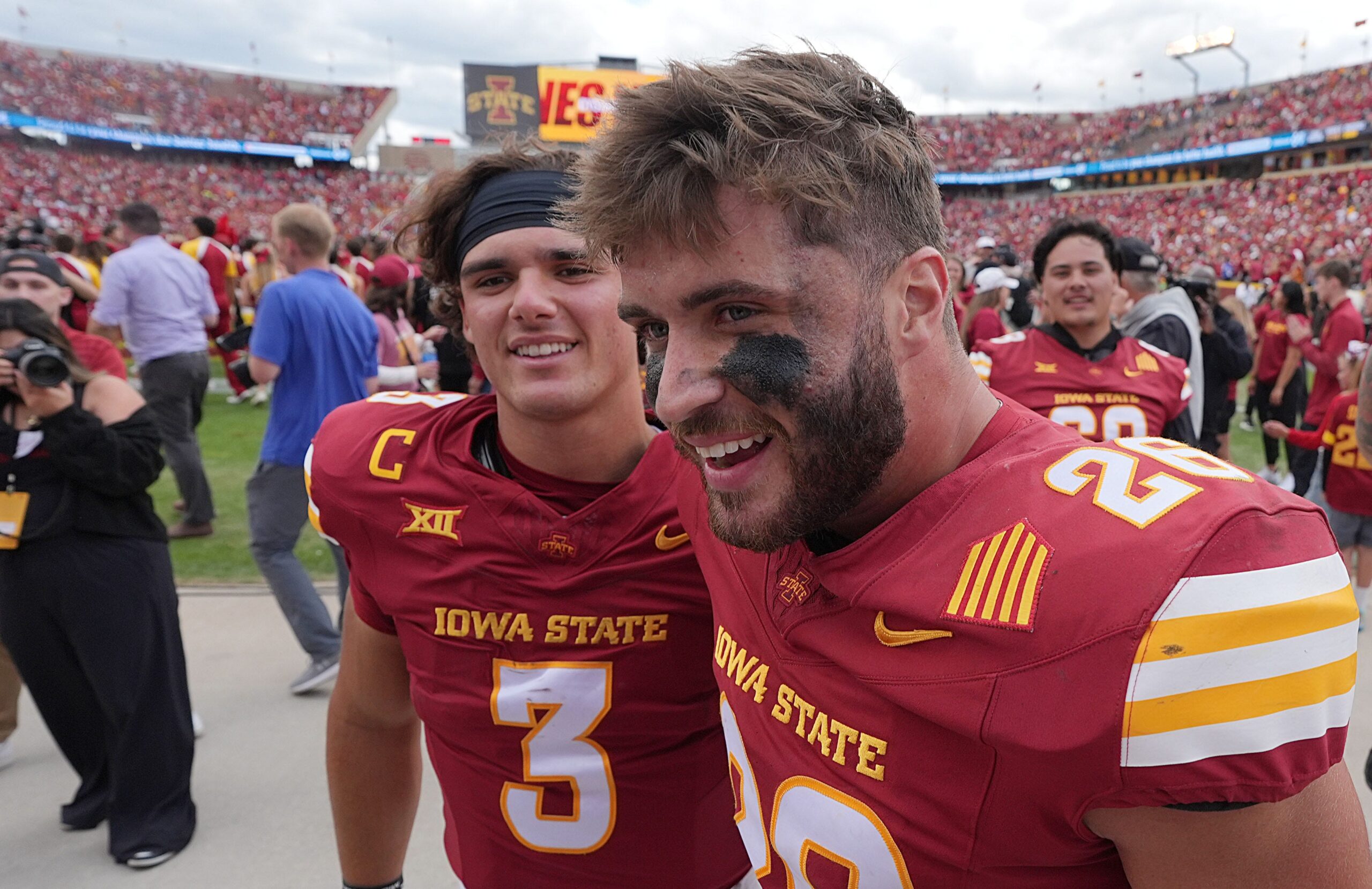Iowa State Cyclones' quarterback Rocco Becht (3) and running back Carson Hansen (26) celebrate after winning 16-13 over Iowa in the Cy-Hawk football at Jack Trice Stadium on Sept. 6, 2025, in Ames, Iowa