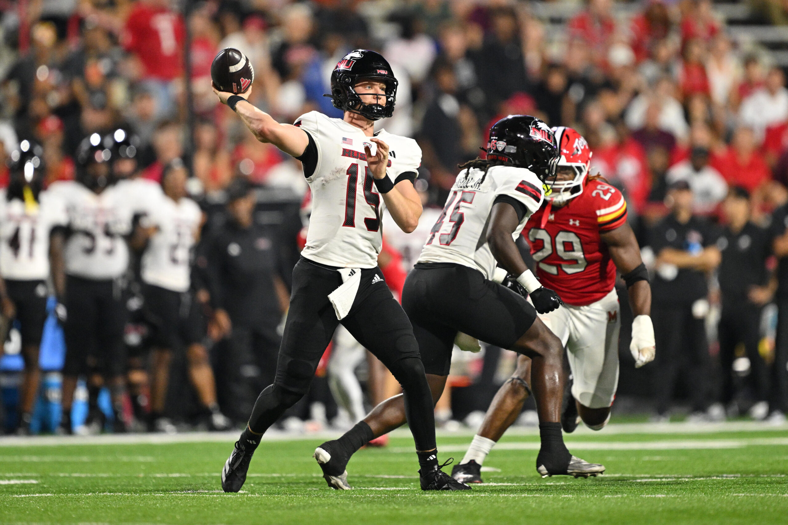 Sep 5, 2025; College Park, Maryland, USA;  Northern Illinois Huskies quarterback Josh Holst (15) in action against the Maryland Terrapins at SECU Stadium. Mandatory Credit: Jamie Sabau-Imagn Images
