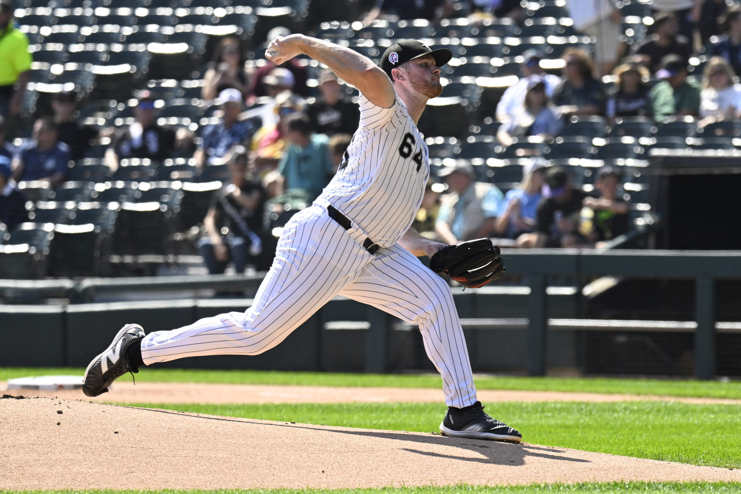 Sep 11, 2025; Chicago, Illinois, USA;  Chicago White Sox pitcher Shane Smith (64) delivers against the Tampa Bay Rays during the first inning at Rate Field. Mandatory Credit: Matt Marton-Imagn Images