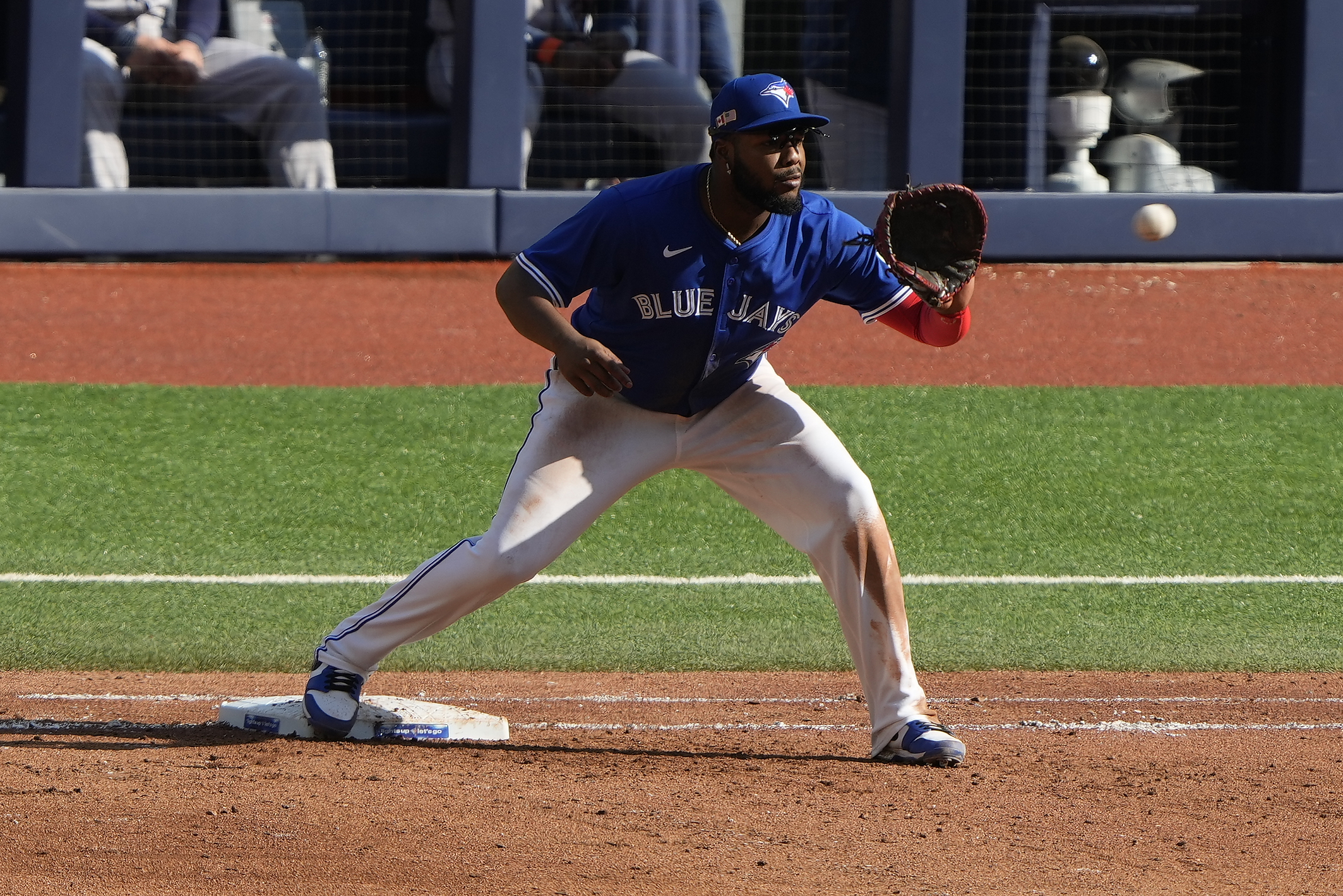 Sep 11, 2025; Toronto, Ontario, CAN; Toronto Blue Jays first baseman Vladimir Guerrero Jr. (27) gets Houston Astros center fielder Mauricio Dubon (not pictured) out at first base during the sixth inning at Rogers Centre. Mandatory Credit: John E. Sokolowski-Imagn Images