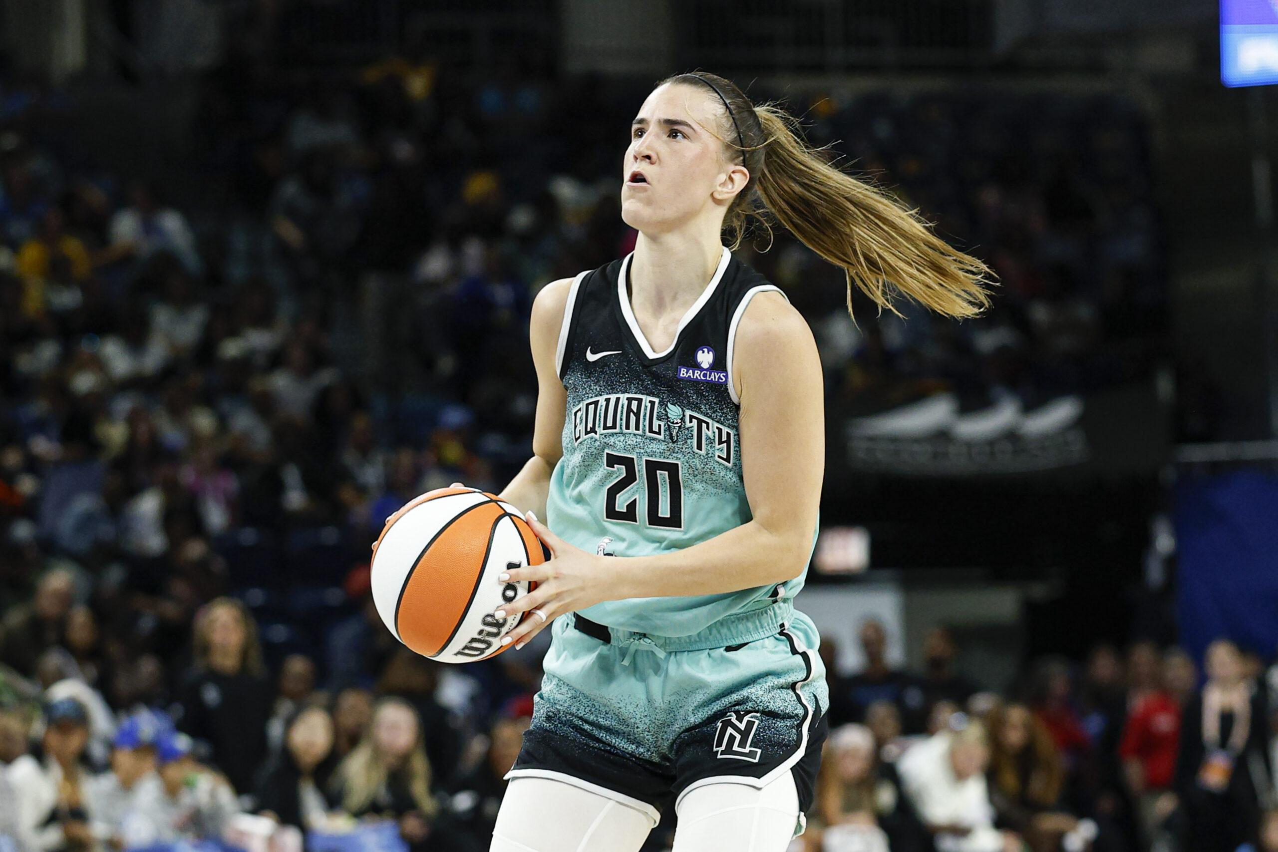 Sep 11, 2025; Chicago, Illinois, USA; New York Liberty guard Sabrina Ionescu (20) looks to shoot against the Chicago Sky during the first half at Wintrust Arena. Mandatory Credit: Kamil Krzaczynski-Imagn Images