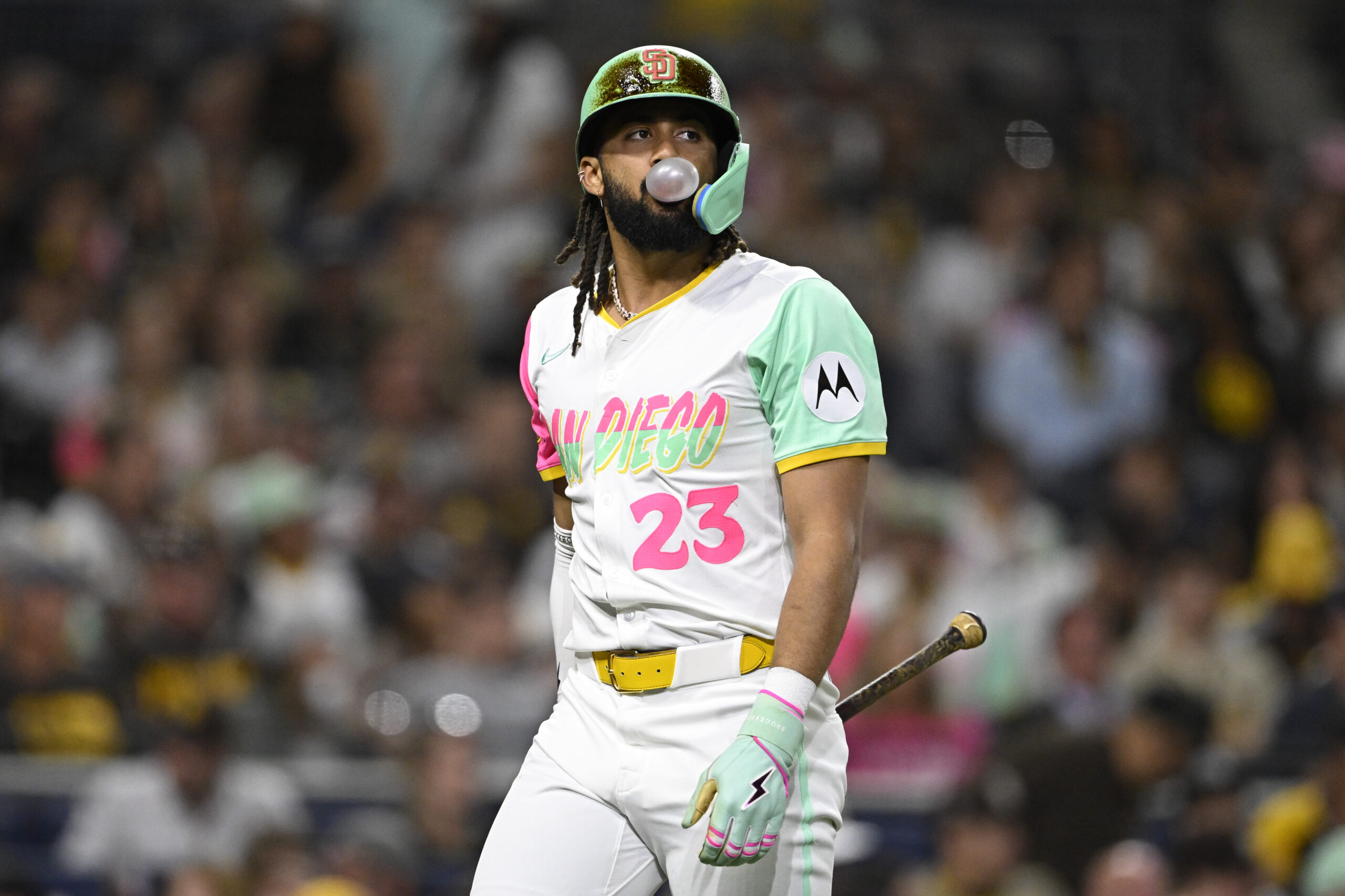 Sep 12, 2025; San Diego, California, USA; San Diego Padres right fielder Fernando Tatis Jr. (23) blows a bubble after striking out during the eighth inning against the Colorado Rockies at Petco Park. Mandatory Credit: Denis Poroy-Imagn Images