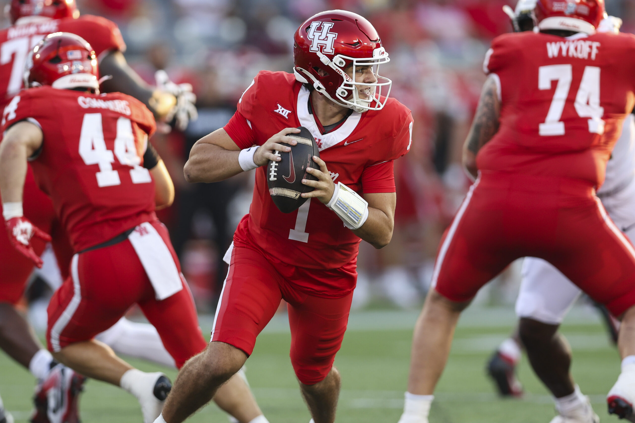 Sep 12, 2025; Houston, Texas, USA; Houston Cougars quarterback Conner Weigman (1) runs with the ball during the first quarter against the Colorado Buffaloes at TDECU Stadium. Mandatory Credit: Troy Taormina-Imagn Images