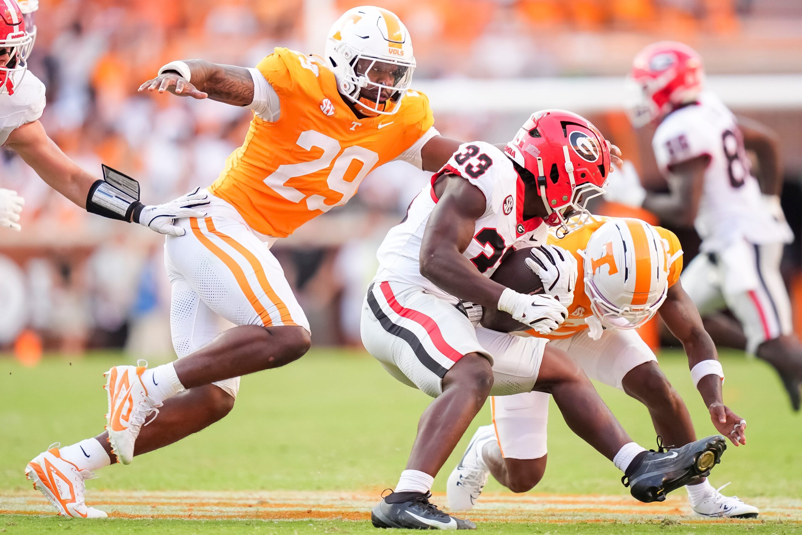 Tennessee defensive lineman Jordan Ross (29) goes in to tackle Georgia running back Chauncey Bowens (33) during a college football game between Tennessee and Georgia at Neyland Stadium in Knoxville, Tenn., on Sept. 13, 2025.