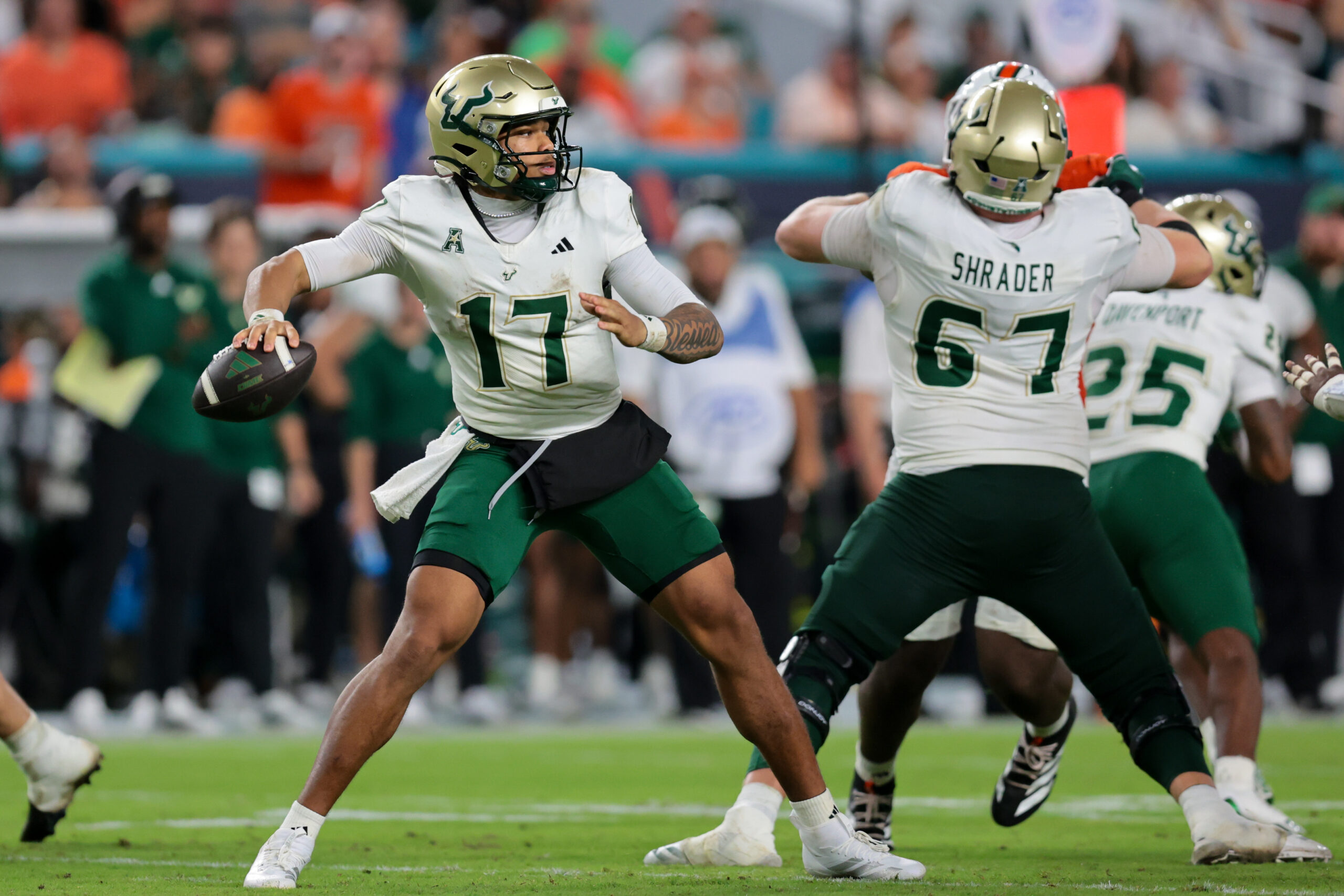 Sep 13, 2025; Miami Gardens, Florida, USA; South Florida Bulls quarterback Byrum Brown (17) passes the football against the Miami Hurricanes during the third quarter at Hard Rock Stadium. Mandatory Credit: Sam Navarro-Imagn Images
