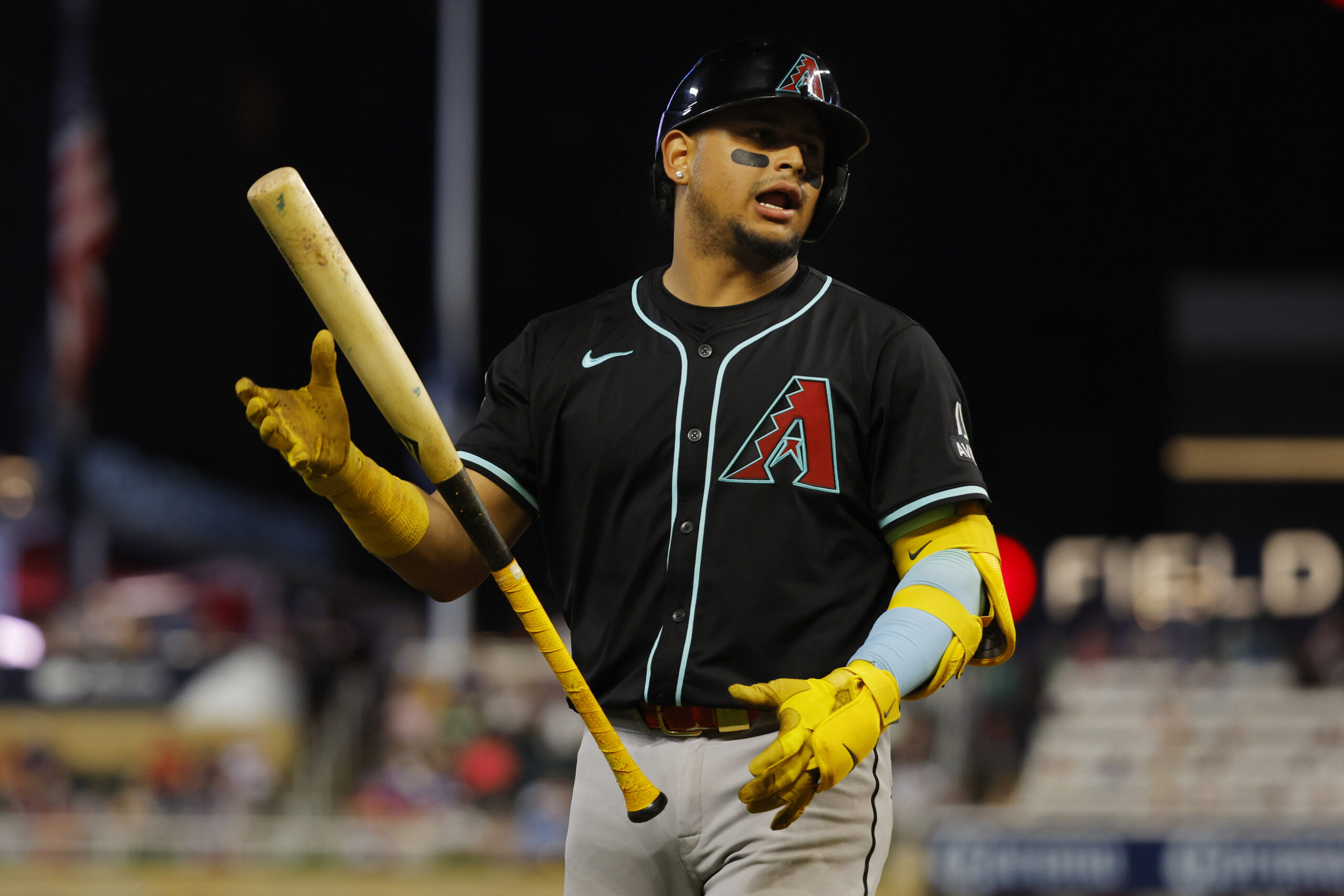 Sep 13, 2025; Minneapolis, Minnesota, USA; Arizona Diamondbacks catcher Gabriel Moreno (14) dislikes the called third strike against him and for the Minnesota Twins in the eighth inning at Target Field. Mandatory Credit: Bruce Kluckhohn-Imagn Images