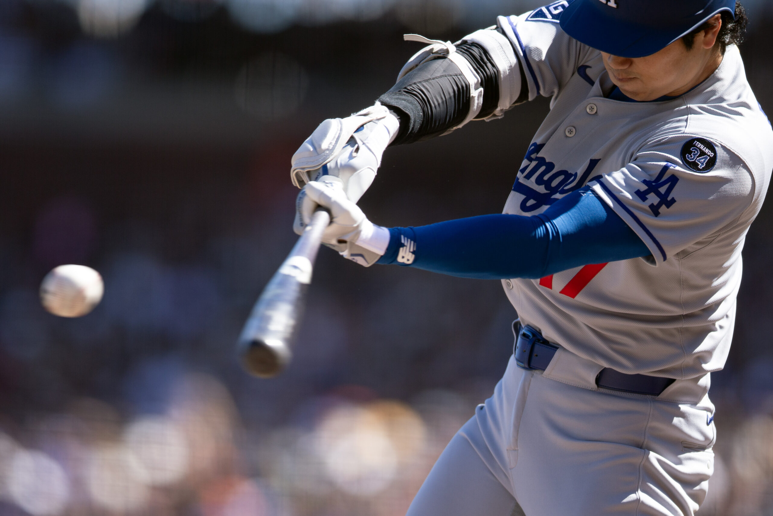 Sep 14, 2025; San Francisco, California, USA; Los Angeles Dodgers designated hitter Shohei Ohtani (17) flies out to left field against the San Francisco Giants during the fifth inning at Oracle Park. Mandatory Credit: D. Ross Cameron-Imagn Images