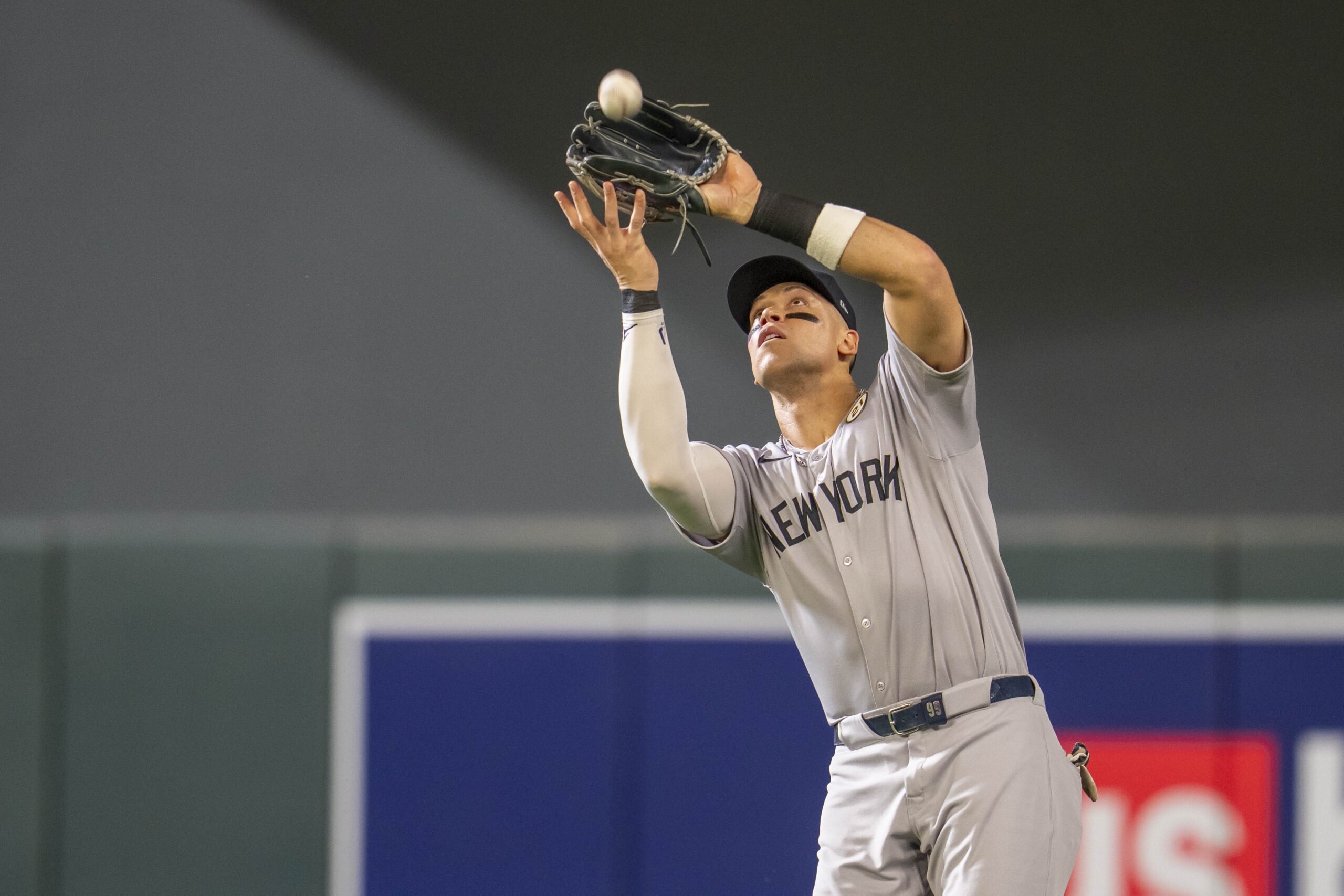 Sep 15, 2025; Minneapolis, Minnesota, USA; New York Yankees right fielder Aaron Judge (99) catches a fly ball against the Minnesota Twins in the fifth inning at Target Field. Mandatory Credit: Jesse Johnson-Imagn Images
