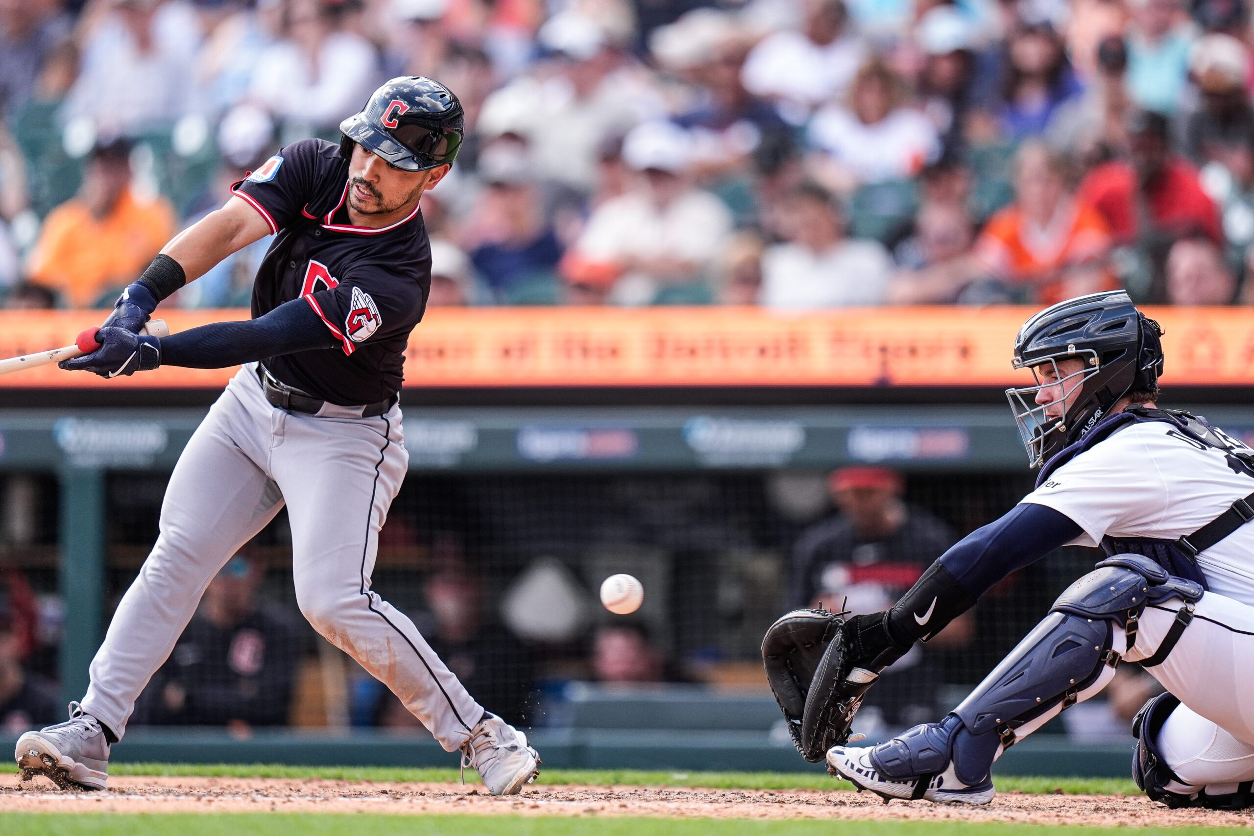 Detroit Tigers catcher Dillon Dingler (13) catches against Cleveland Guardians left fielder Steven Kwan (38) during the ninth inning at Comerica Park in Detroit on Thursday, Sept. 18, 2025.