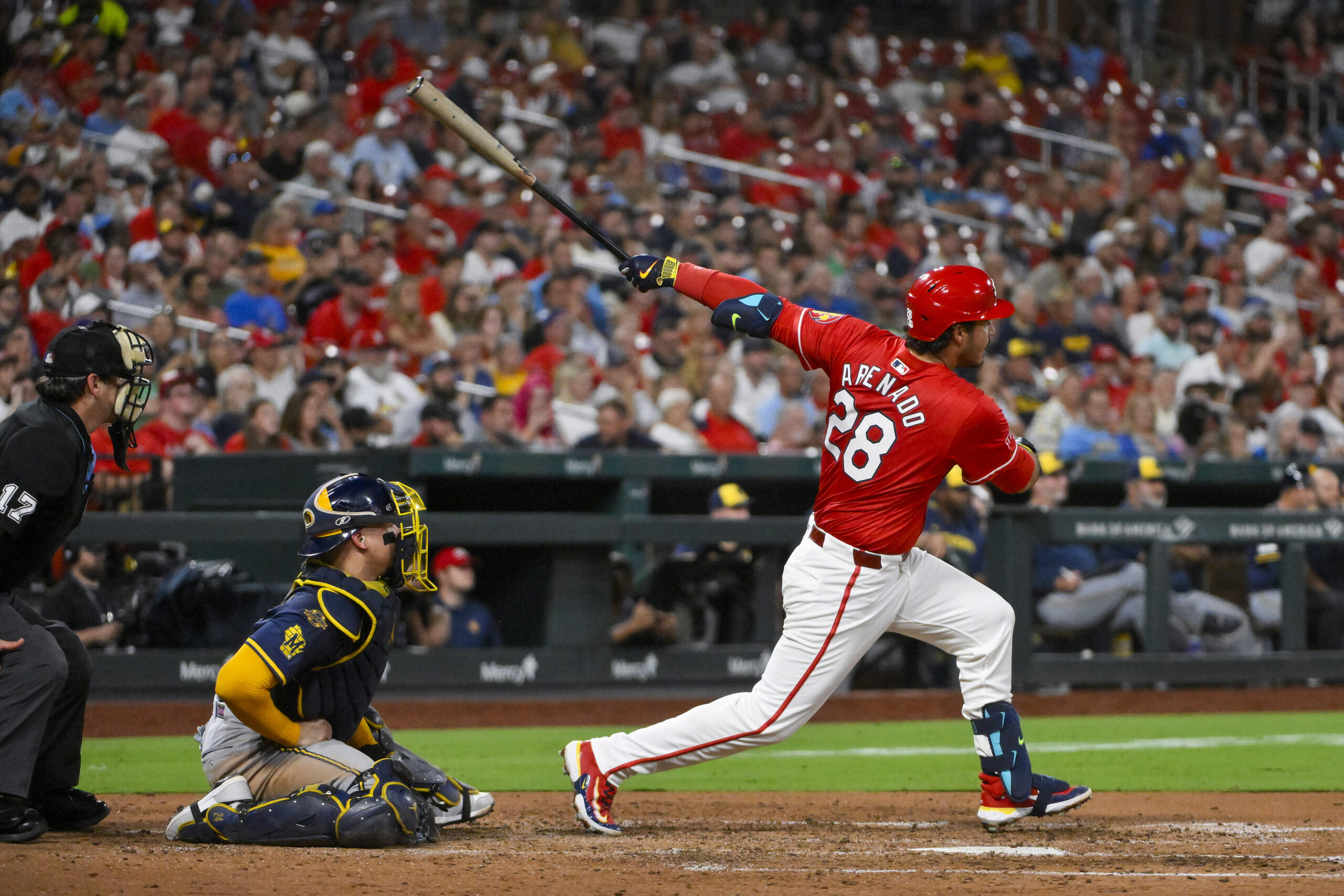 Sep 19, 2025; St. Louis, Missouri, USA;  St. Louis Cardinals third baseman Nolan Arenado (28) hits a three run double against the Milwaukee Brewers during the fifth inning at Busch Stadium. Mandatory Credit: Jeff Curry-Imagn Images