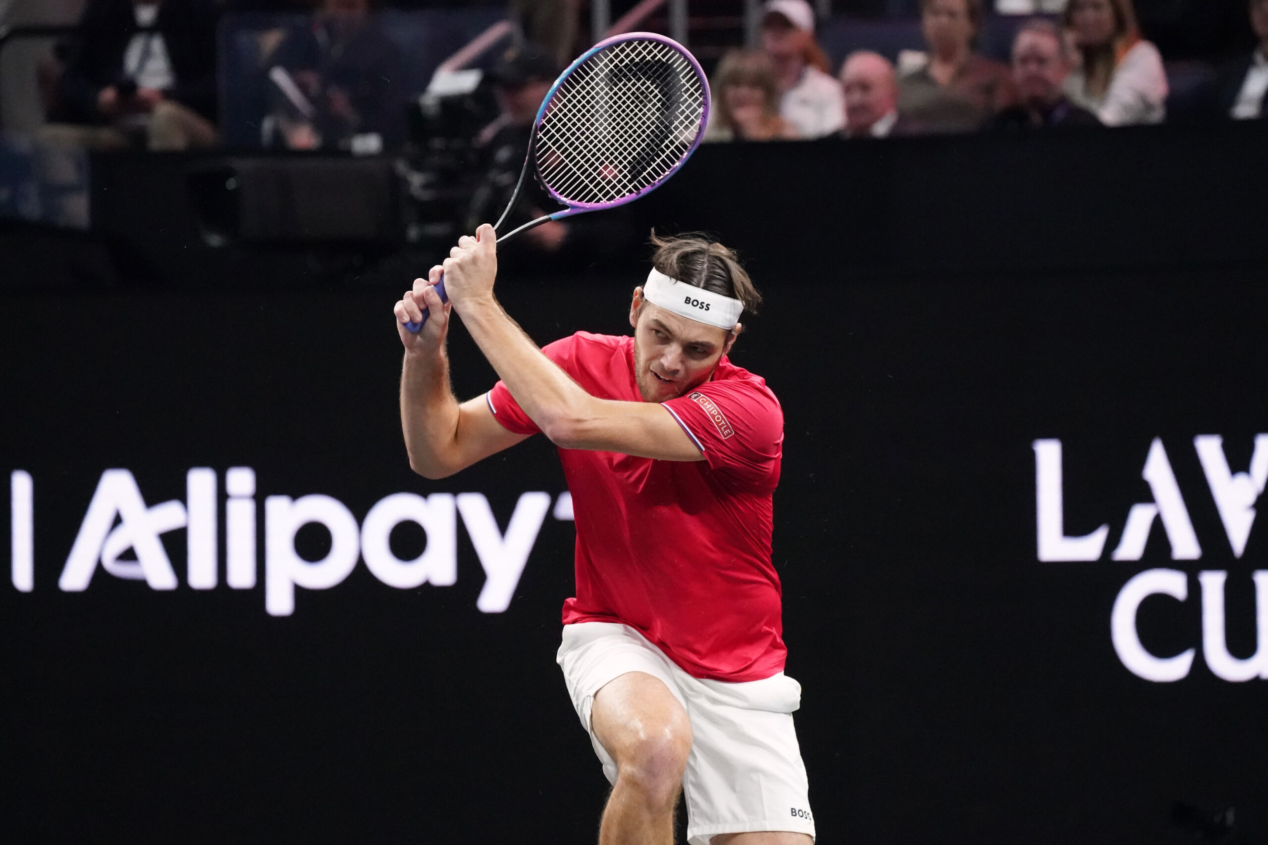 Sep 21, 2025; San Francisco, CA, USA;  Team World player Taylor Fritz returns the ball from Team Europe player Alexander Zverev during the Laver Cup at Chase Center. Mandatory Credit: David Gonzales-Imagn Images