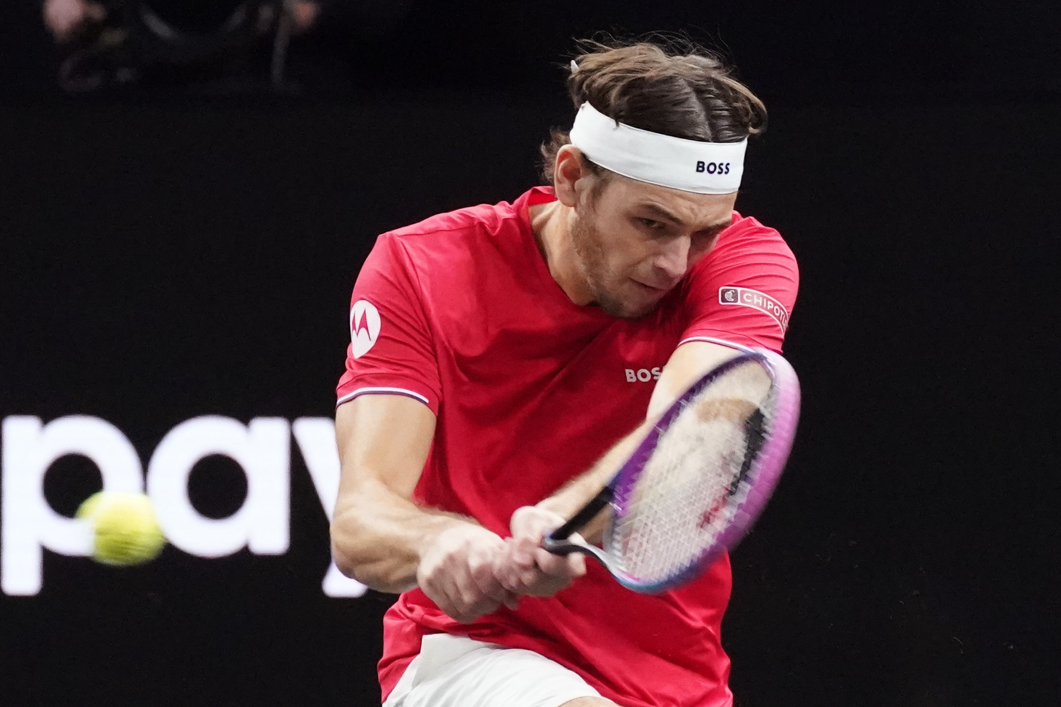 Sep 21, 2025; San Francisco, CA, USA;  Team World player Taylor Fritz returns the ball from Team Europe player Alexander Zverev during the Laver Cup at Chase Center. Mandatory Credit: David Gonzales-Imagn Images