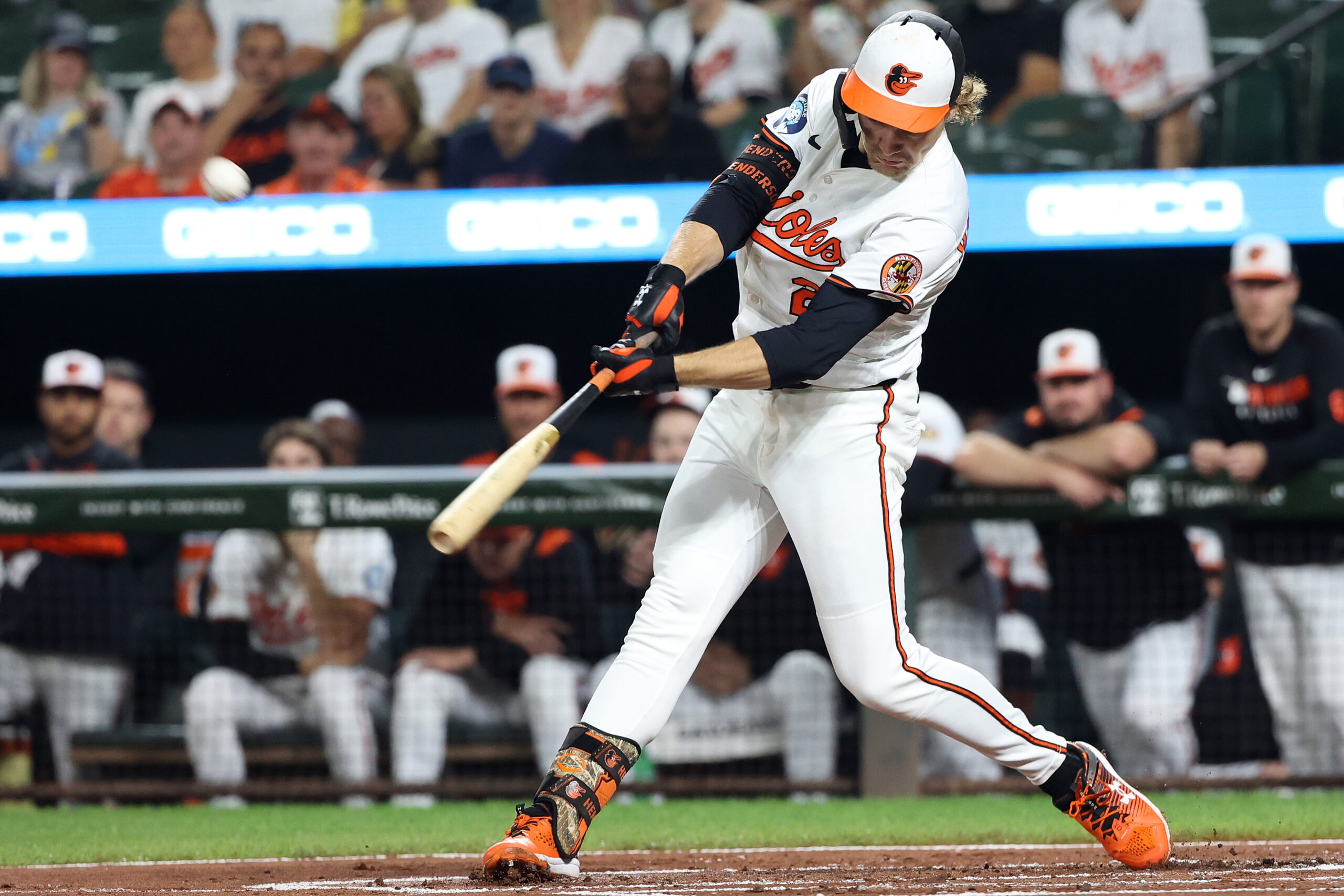Sep 23, 2025; Baltimore, Maryland, USA; Baltimore Orioles shortstop Gunnar Henderson (2) hits a sacrifice fly to score a run during the first inning against the Tampa Bay Rays at Oriole Park at Camden Yards. Mandatory Credit: Daniel Kucin Jr.-Imagn Images