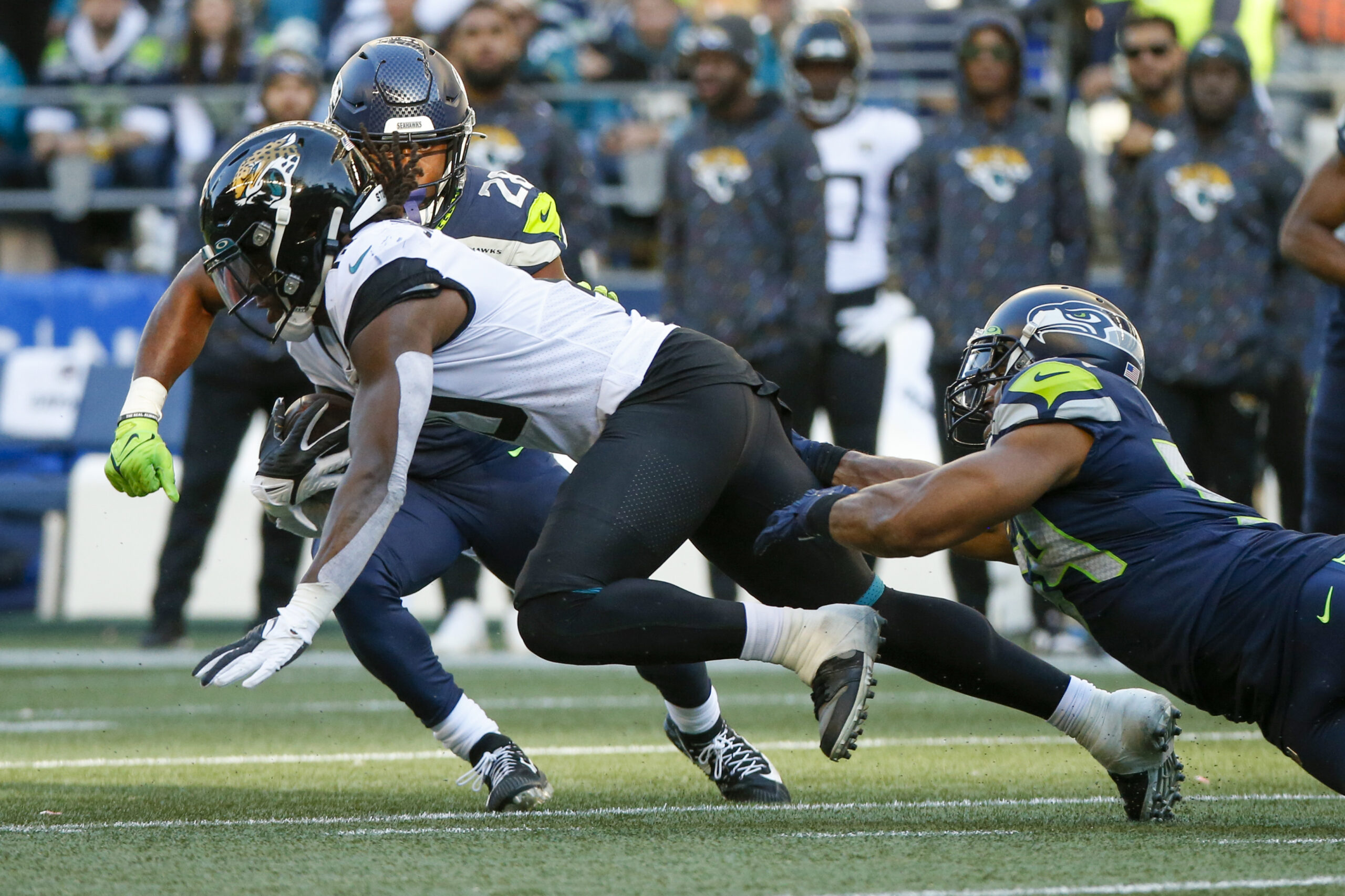 Oct 31, 2021; Seattle, Washington, USA; Jacksonville Jaguars wide receiver Laviska Shenault Jr. (10) runs for yards after the catch  as Seattle Seahawks middle linebacker Bobby Wagner (54) reaches for a tackle during the fourth quarter at Lumen Field. Mandatory Credit: Joe Nicholson-Imagn Images