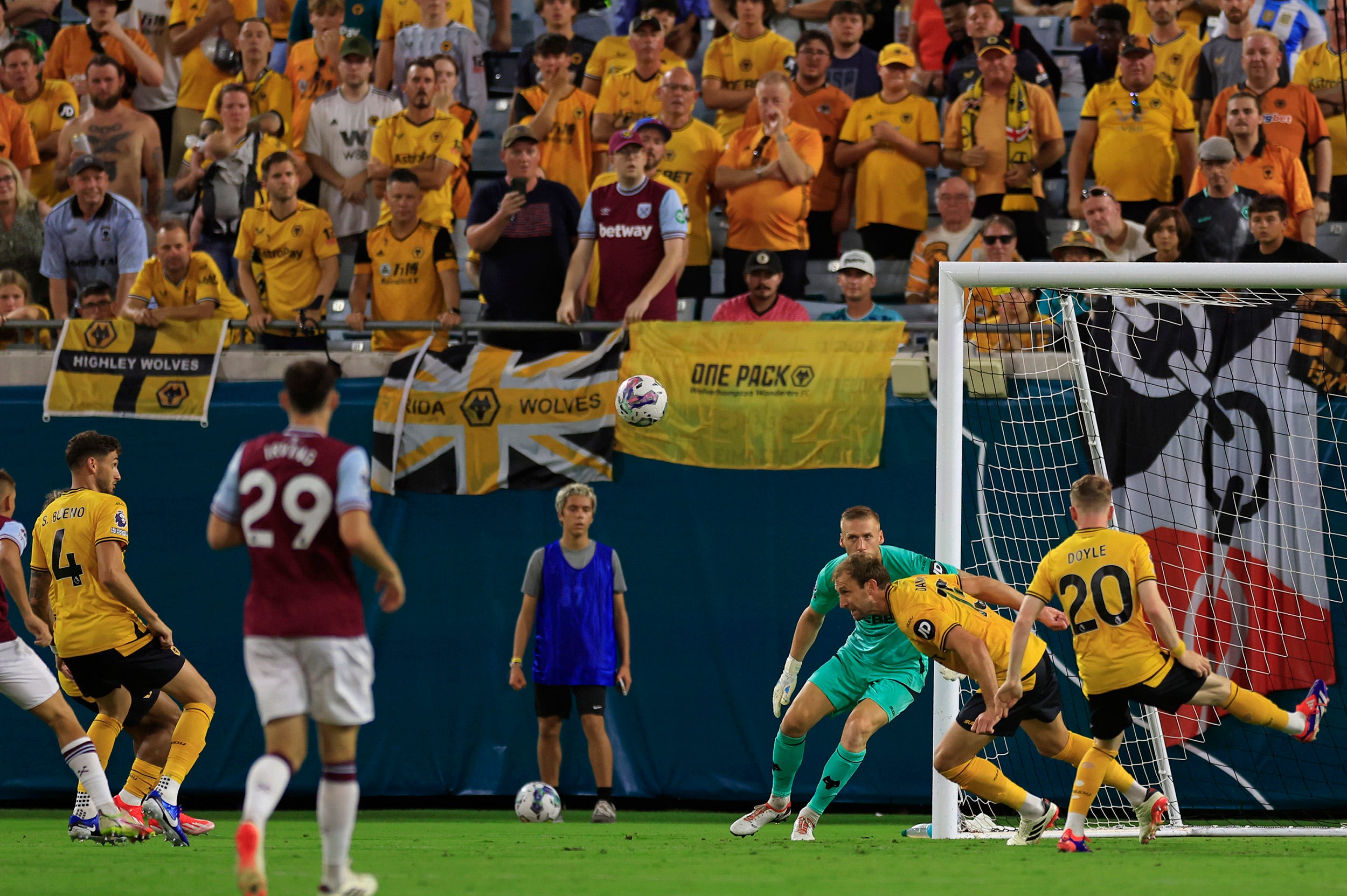 Wolverhampton Wanderers defender Craig Dawson (15) clears the net as goalkeeper Daniel Bentley (25) looks on during the second half of The Stateside Cup soccer tournament game Saturday, July 27, 2024 at EverBank Stadium in Jacksonville, Fla. The Wolverhampton Wanderers defeated West Ham United 3-1 in exhibition play.