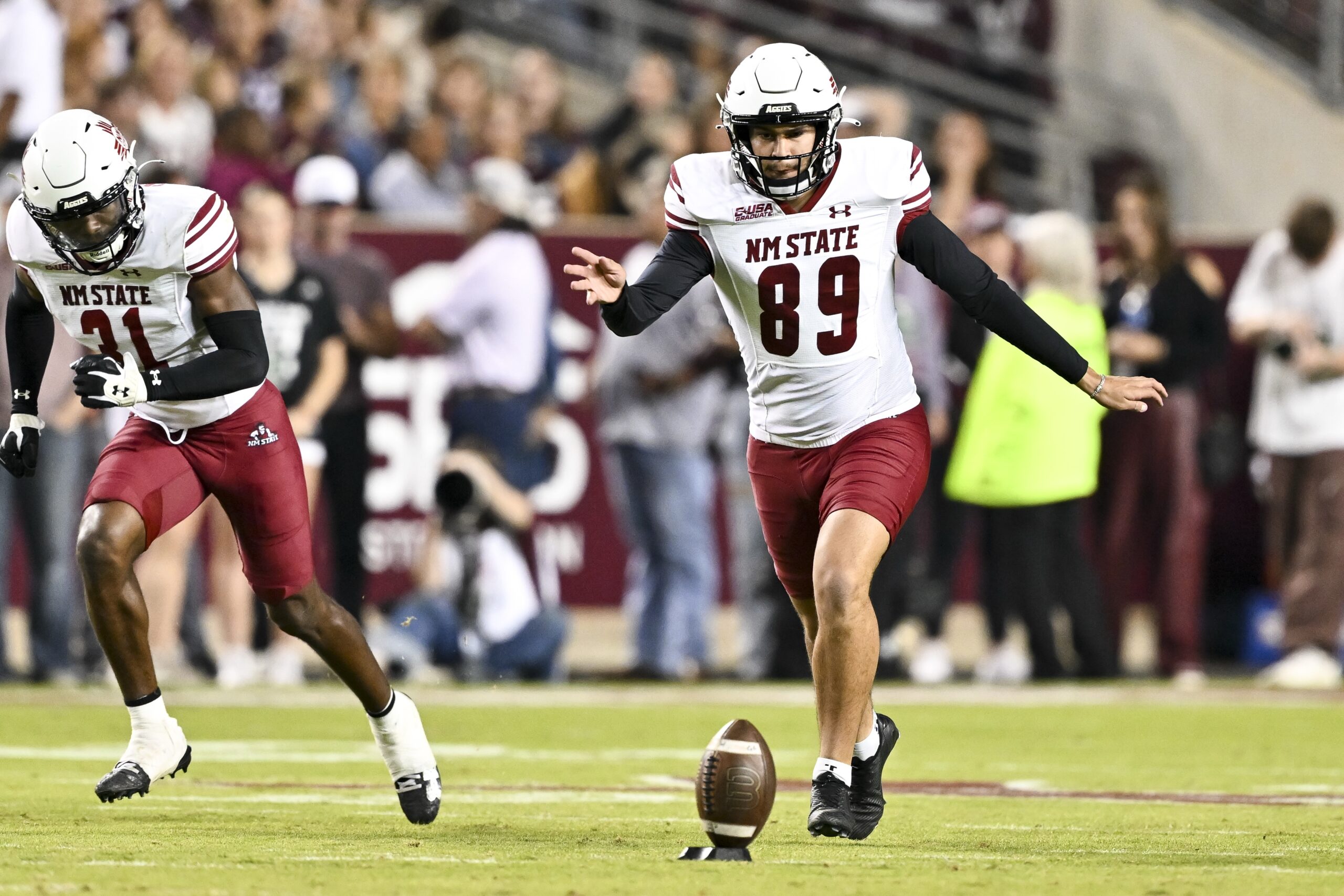 Nov 16, 2024; College Station, Texas, USA; New Mexico State Aggies place kicker Abraham Montano (89) kicks the ball during the second half against the Texas A&M Aggies at Kyle Field. Mandatory Credit: Maria Lysaker-Imagn Images