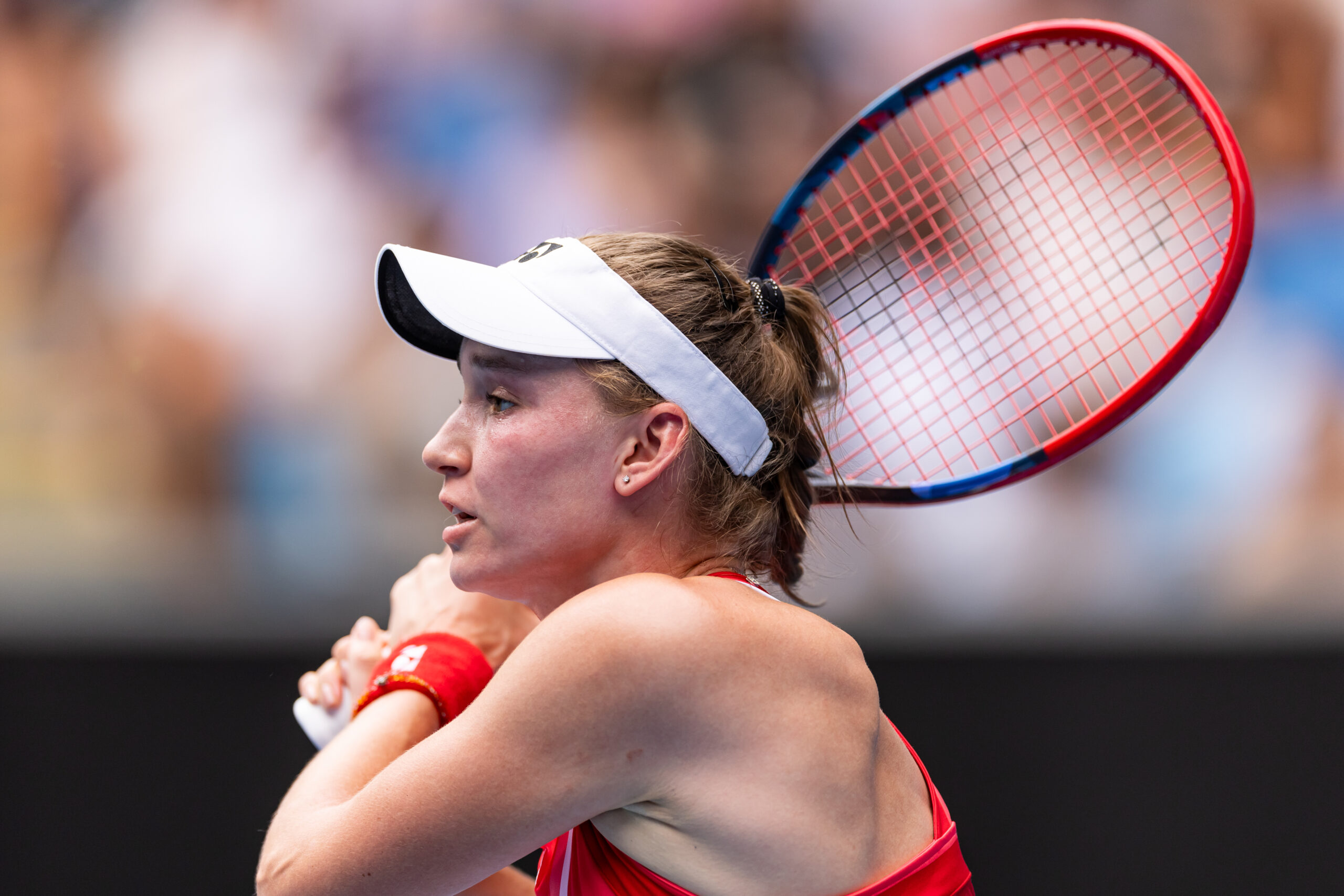 Jan 20, 2025; Melbourne, Victoria, Australia; Elena Rybakina of Kazakhstan in action during her match against Madison Keys of United States of America in the fourth round of the women's singles at the 2025 Australian Open at Melbourne Park. Mandatory Credit: Mike Frey-Imagn Images