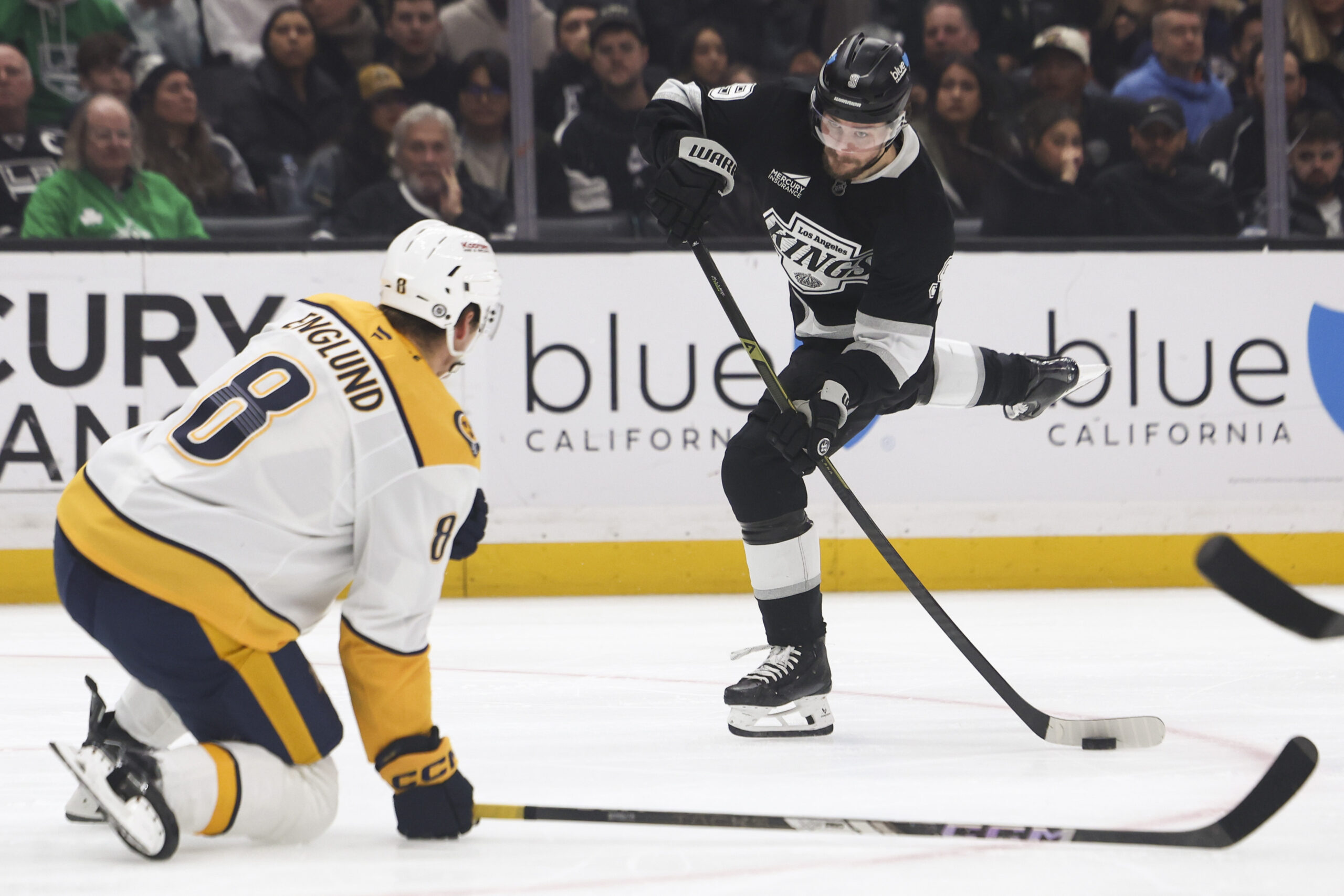 Mar 15, 2025; Los Angeles, California, USA;  Los Angeles Kings right wing Adrian Kempe (9) looks to shoot against the Nashville Predators during the second period of a hockey game at Crypto.com Arena. Mandatory Credit: Jessica Alcheh-Imagn Images
