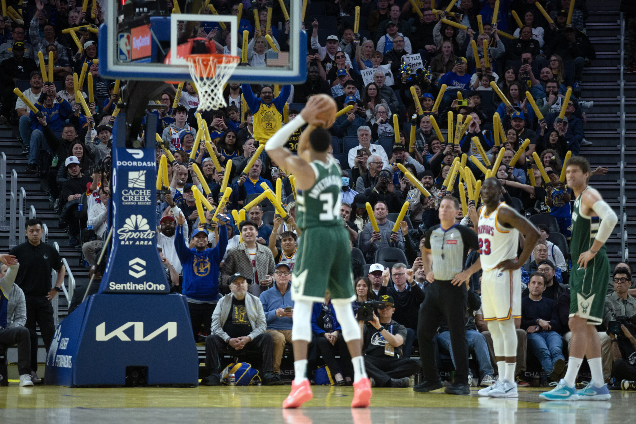 Mar 18, 2025; San Francisco, California, USA; Golden State Warriors fans attempt to distract Milwaukee Bucks forward Giannis Antetokounmpo (34) as he shoots a free throw during the fourth quarter at Chase Center. Mandatory Credit: D. Ross Cameron-Imagn Images