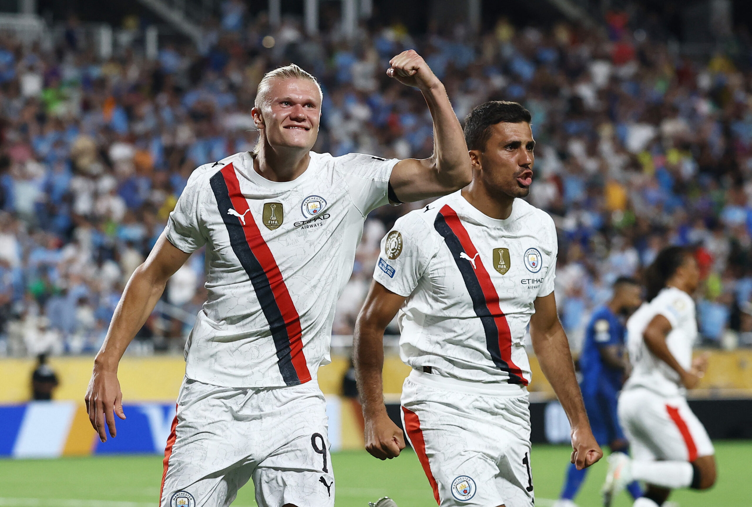 [Subscription Customers Only] Jun 30, 2025; Orlando, Florida, USA; Manchester City forward Erling Haaland (9) celebrates scoring their second goal with midfielder Rodri (16) during a round of 16 match of the 2025 FIFA Club World Cup at Camping World Stadium. Mandatory Credit: Lee Smith-Reuters via Imagn Images