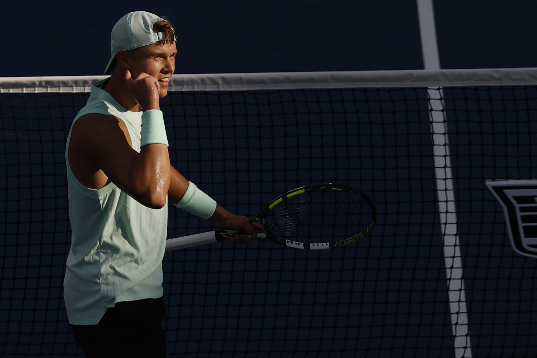 Aug 25, 2025; Flushing, NY, USA; Holger Rune (DEN) reacts after winning the second set tiebreaker against Botic van de Zandschulp (NED)(not pictured) on day two of the 2025 US Open tennis tournament at USTA Billie Jean King National Tennis Center. Mandatory Credit: Geoff Burke-Imagn Images