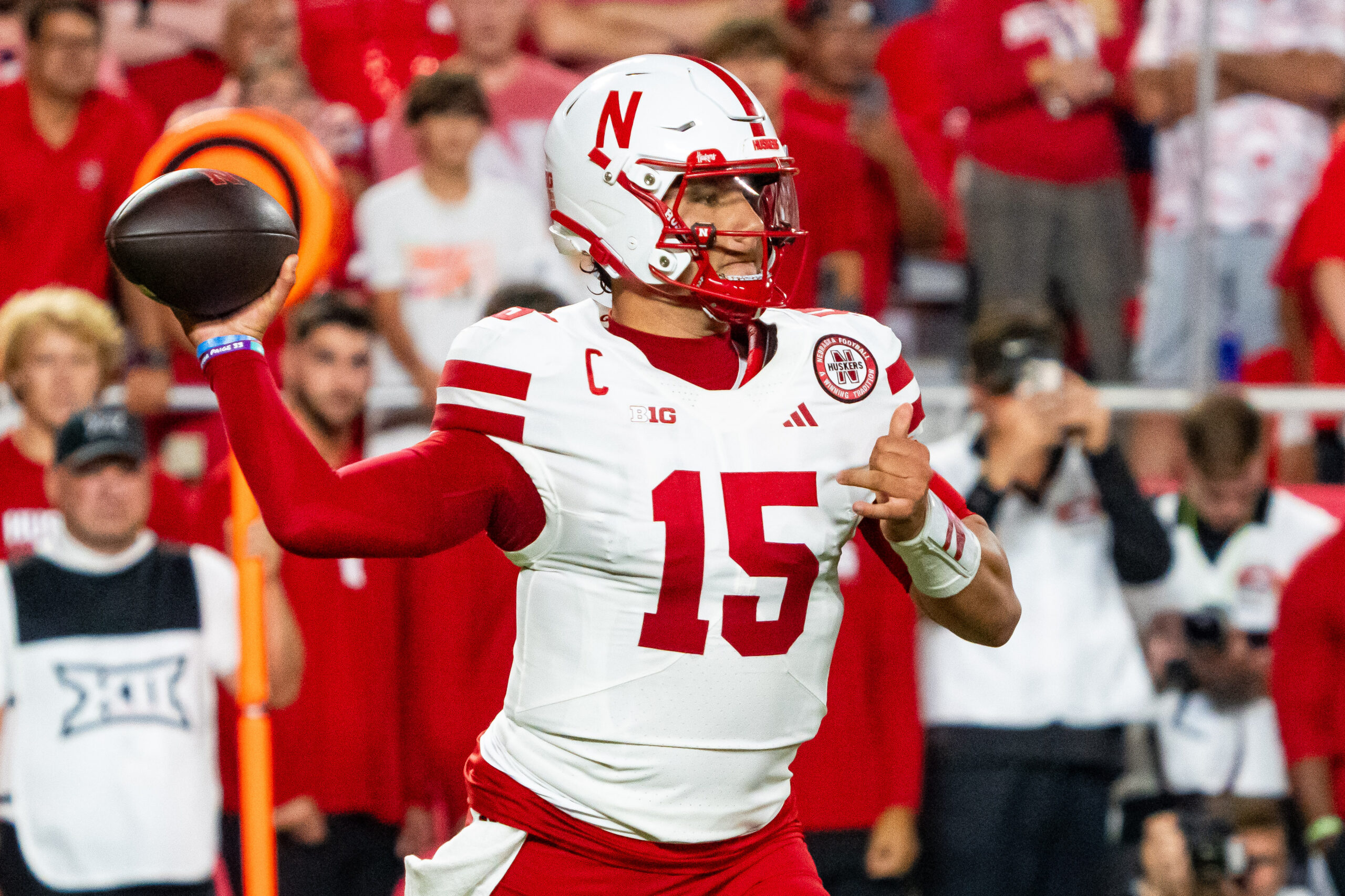 Aug 28, 2025; Kansas City, Missouri, USA; Nebraska Cornhuskers quarterback Dylan Raiola (15) passes against the Cincinnati Bearcats during the first quarter at GEHA Field at Arrowhead Stadium. Mandatory Credit: Dylan Widger-Imagn Images