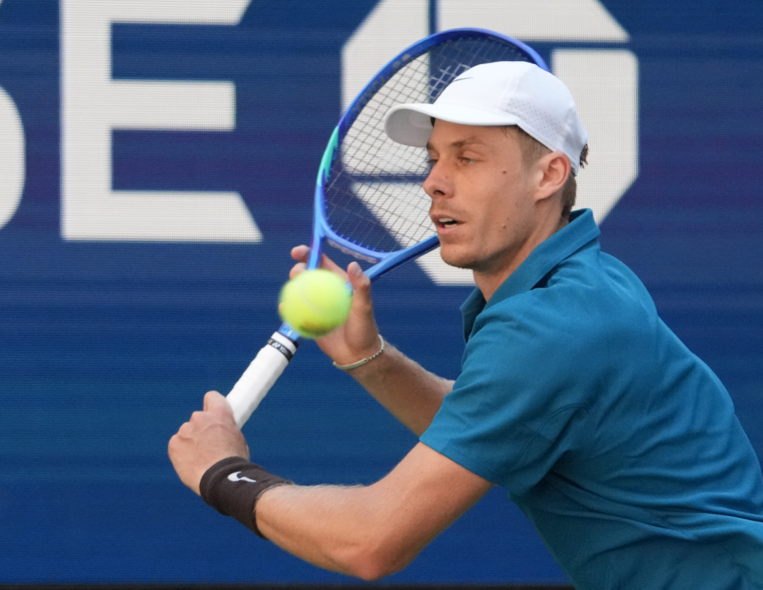 Aug 30, 2025; Flushing, NY, USA;  Denis Shapovalov (CAN) hits to Jannik Sinner (ITA) (not pictured) on day seven of the 2025 U.S. Open tennis tournament at the USTA Billie Jean King National Tennis Center. Mandatory Credit: Robert Deutsch-Imagn Images