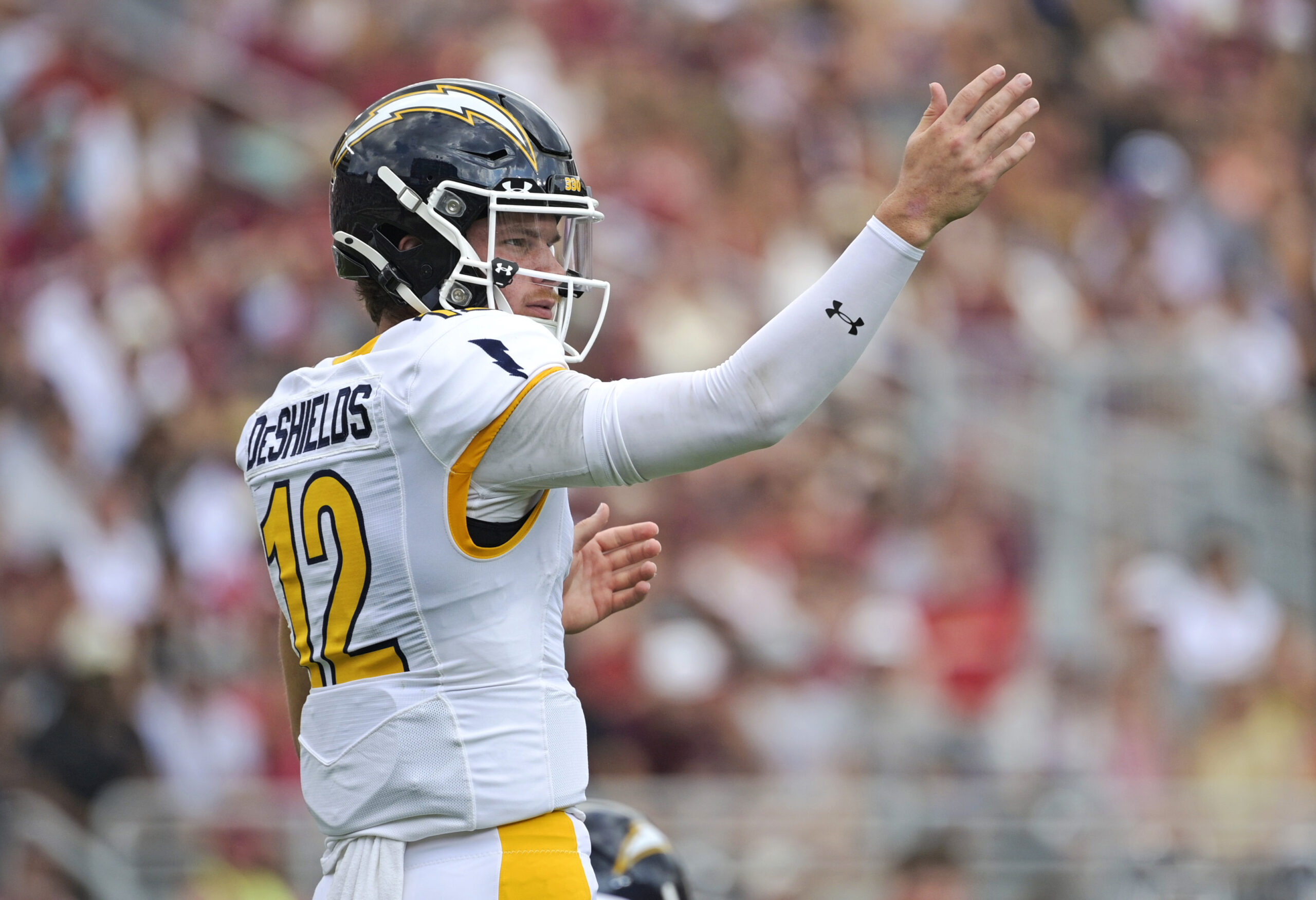 Sep 20, 2025; Tallahassee, Florida, USA; Kent State Golden Flashes quarterback Dru DeShields (12) directs players at the line during the first half against the Florida State Seminoles at Doak S. Campbell Stadium. Mandatory Credit: Melina Myers-Imagn Images