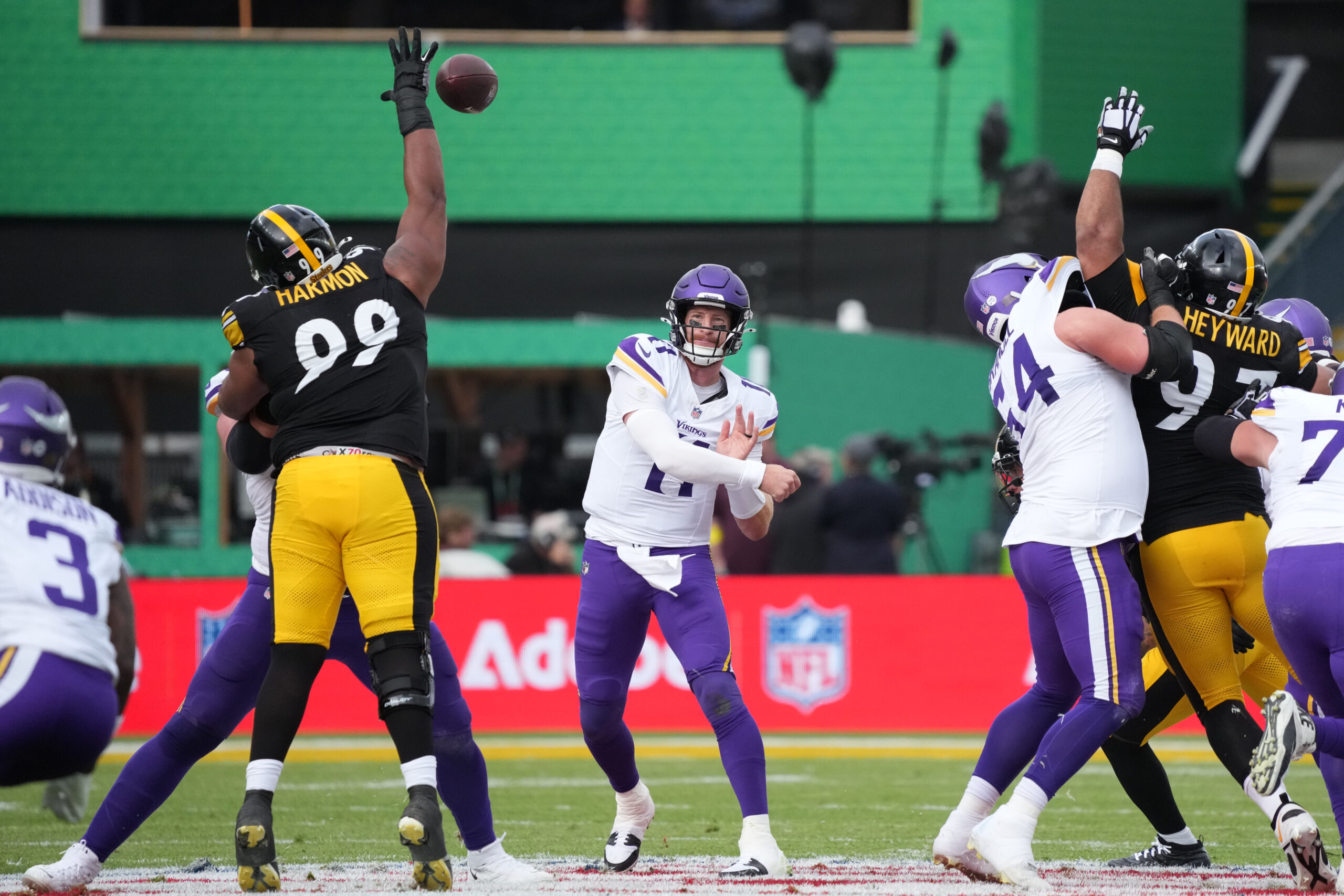 Sep 28, 2025; Dublin, Ireland; Minnesota Vikings quarterback Carson Wentz (11) throws the ball against Pittsburgh Steelers defensive tackle Derrick Harmon (99) during an NFL International Series game at Croke Park. Mandatory Credit: Kirby Lee-Imagn Images