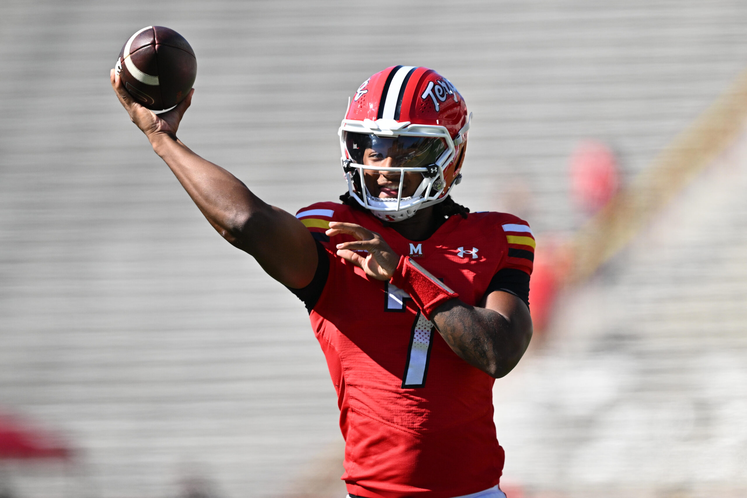 Oct 4, 2025; College Park, Maryland, USA;  Maryland Terrapins quarterback Malik Washington (7) warms up before a game against the Washington Huskies at SECU Stadium. Mandatory Credit: Jamie Sabau-Imagn Images