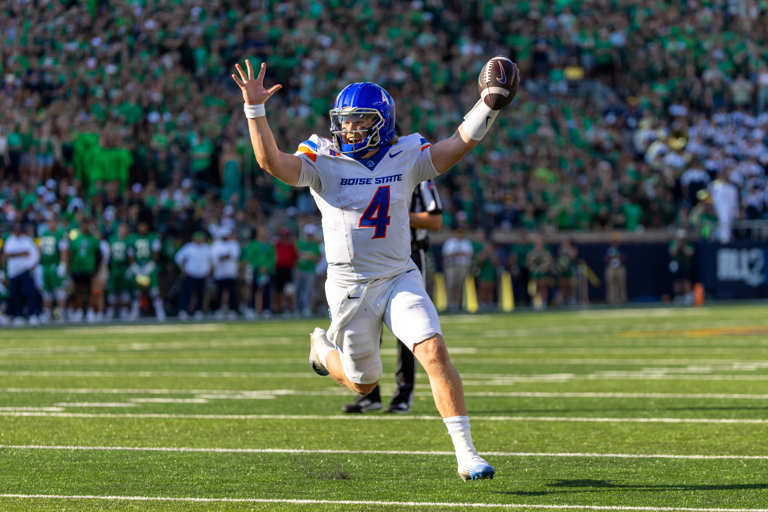 Oct 4, 2025; South Bend, Indiana, USA; Boise State Broncos quarterback Maddux Madsen (4) celebrates as he runs in a touchdown against the Notre Dame Fighting Irish during the first half at Notre Dame Stadium. Mandatory Credit: Michael Caterina-Imagn Images