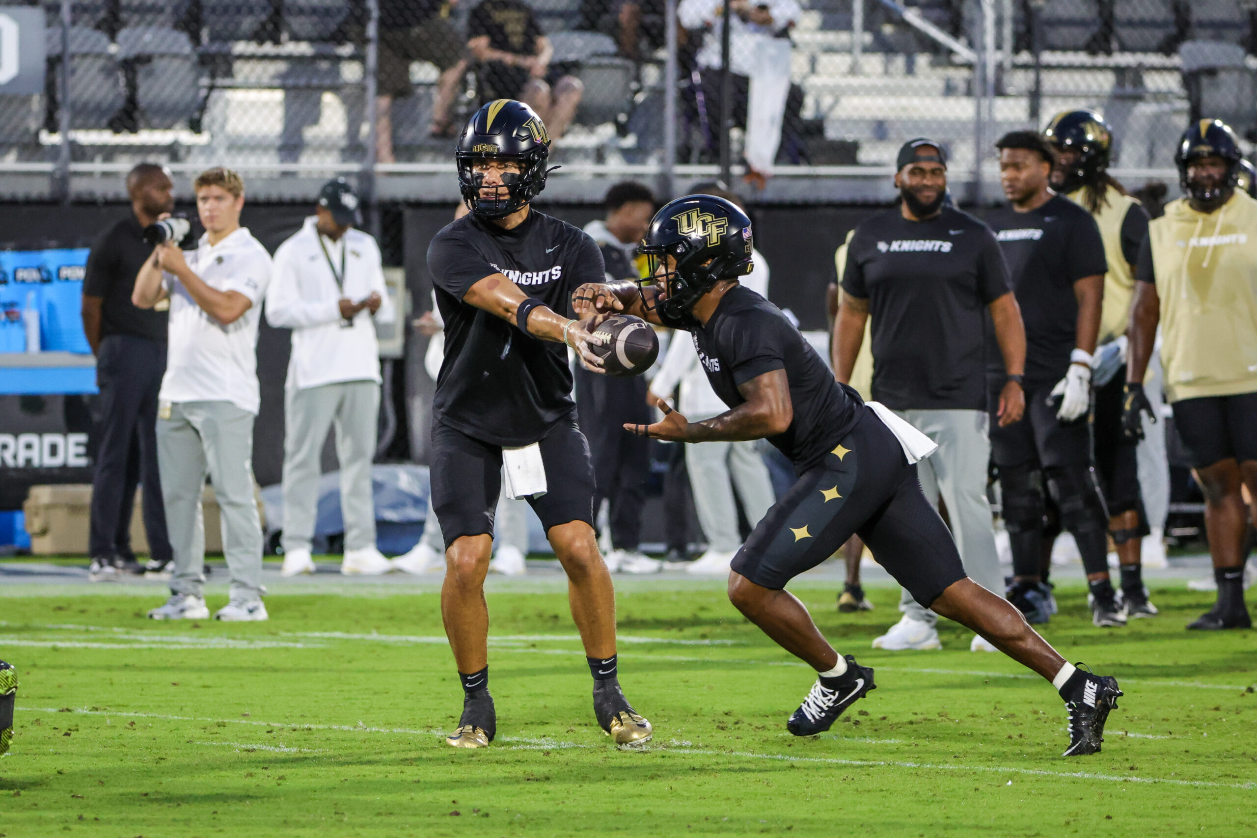 Oct 4, 2025; Orlando, Florida, USA; UCF Knights quarterback Tayven Jackson (2) warms up before the game against the Kansas Jayhawks at FBC Mortgage Stadium. Mandatory Credit: Mike Watters-Imagn Images