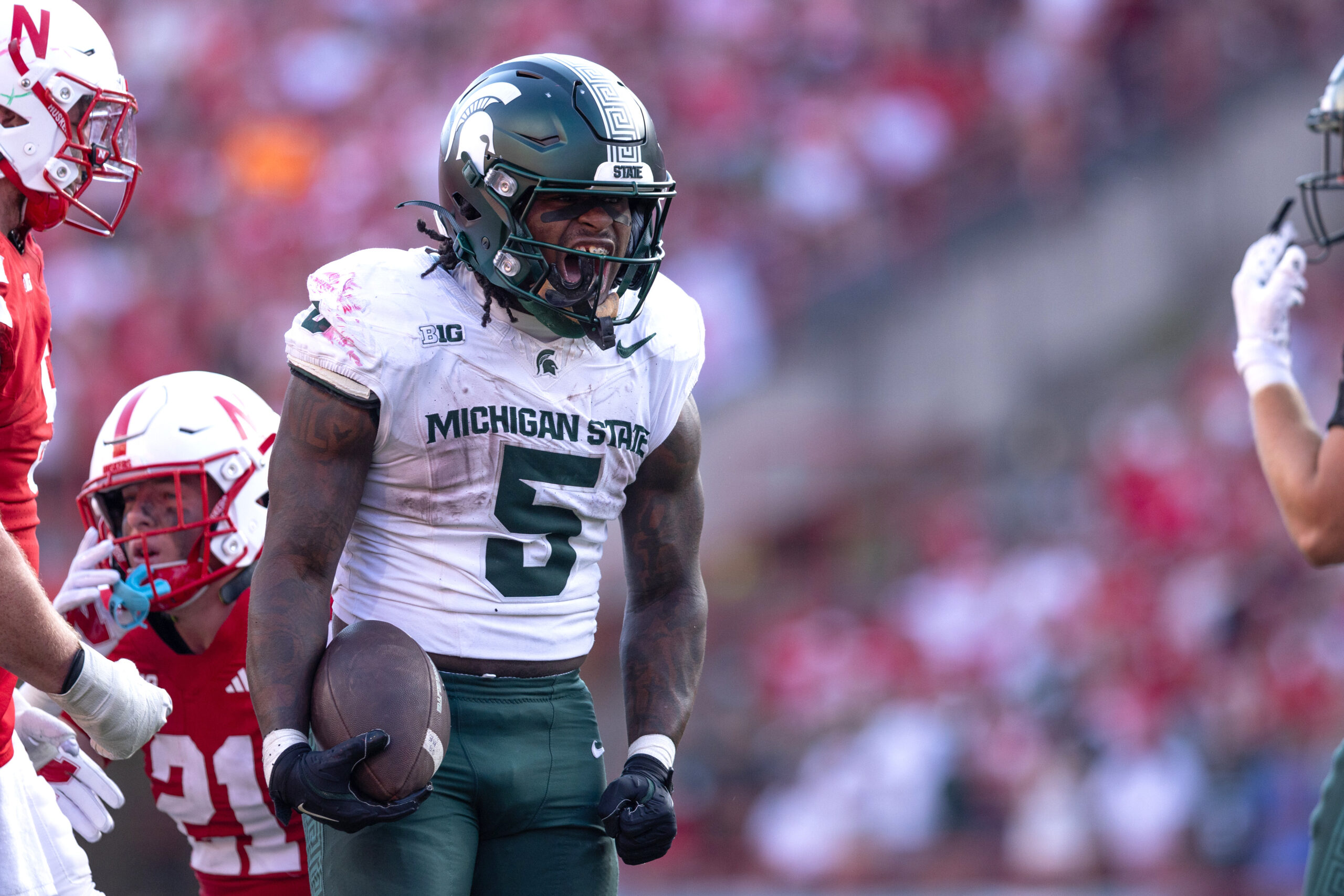 Oct 4, 2025; Lincoln, Nebraska, USA;  Michigan State Spartans running back Makhi Frazier (5) celebrates during the game against Nebraska at Memorial Stadium. Mandatory Credit: Kylie Graham-Imagn Images