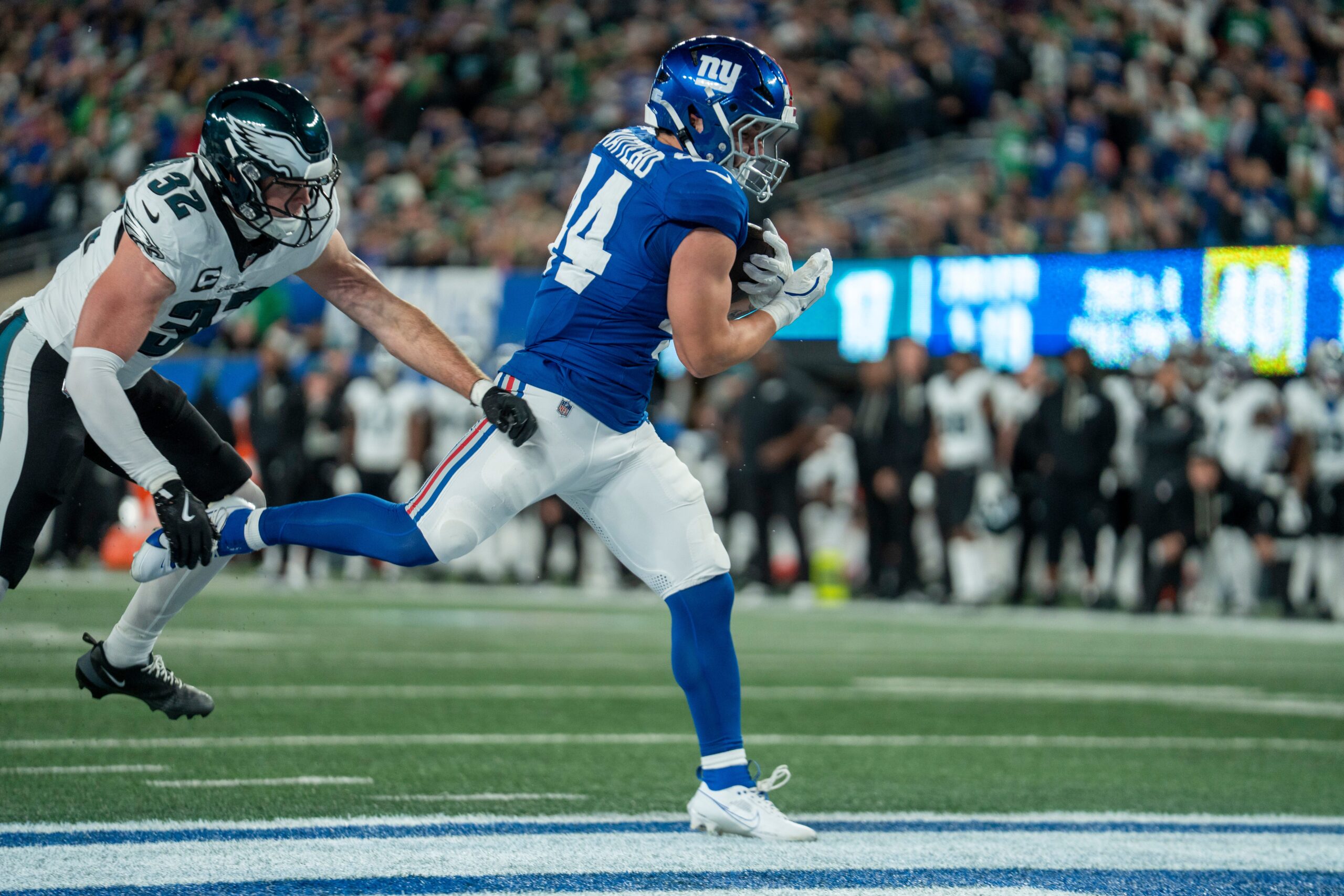 New York Giants running back Cam Skattebo (44) scores a touchdown in the second quarter during a Thursday Night Football game between the New York Giants and the Philadelphia Eagles at MetLife Stadium in East Rutherford on Oct. 9, 2025.