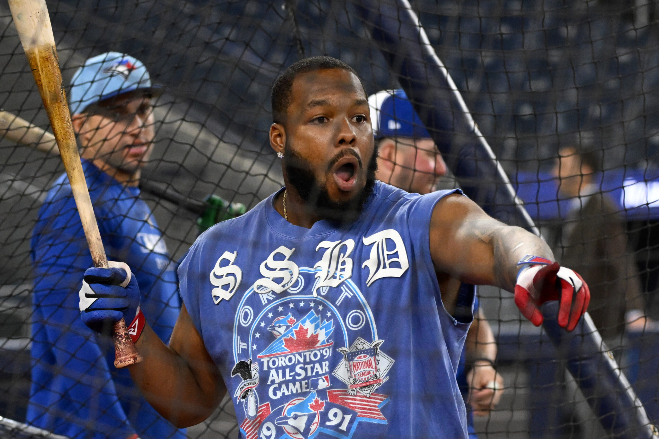 Oct 11, 2025; Toronto, Ontario, CA;  Toronto Blue Jays first baseman Vladimir Guerrero Jr. (27) reacts in batting practice during workouts for the American League Championship Series at Rogers Centre.  Mandatory Credit: Dan Hamilton-Imagn Images