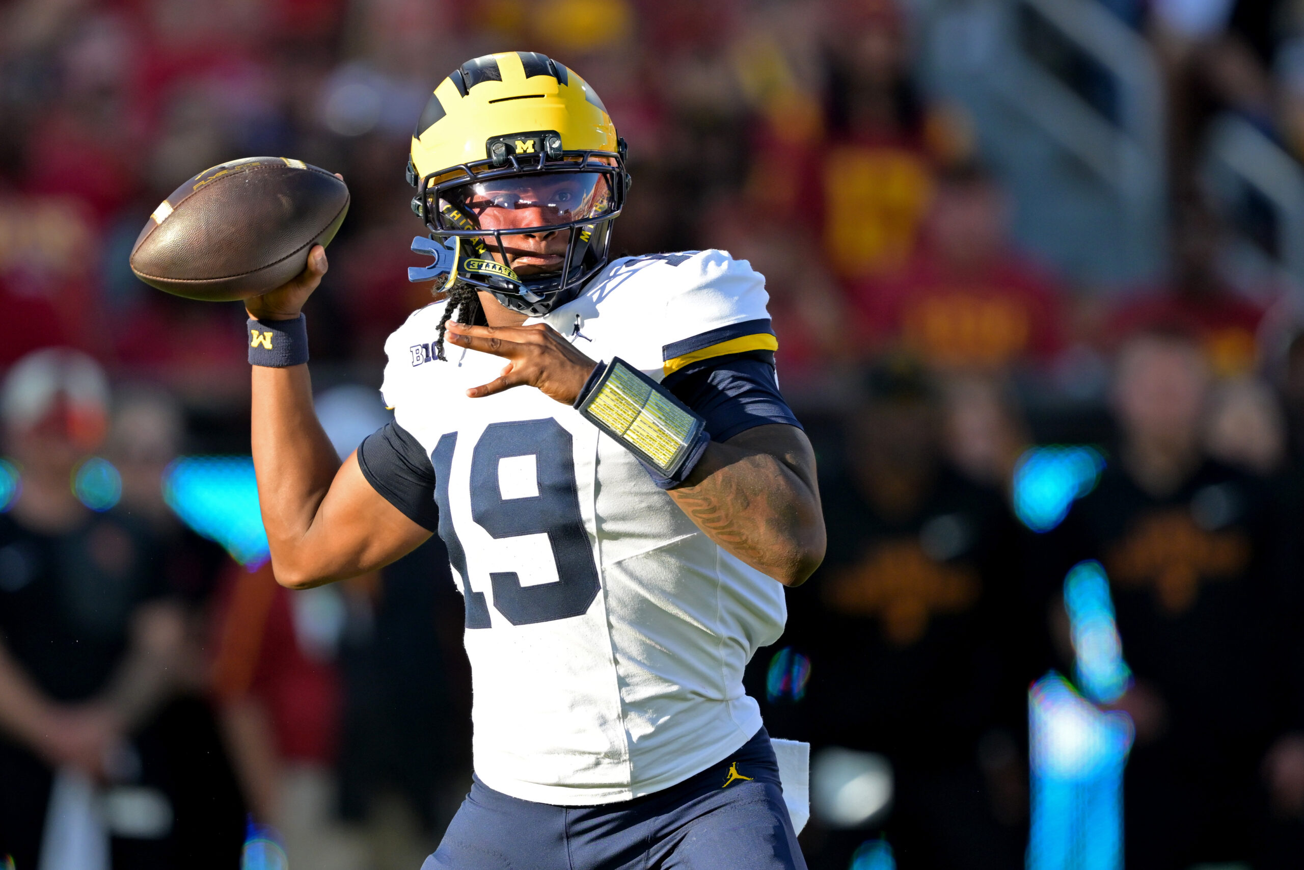 Oct 11, 2025; Los Angeles, California, USA;  Michigan Wolverines quarterback Bryce Underwood (19) throws a pass in the first half against the USC Trojans at United Airlines Field at the Los Angeles Memorial Coliseum. Mandatory Credit: Jayne Kamin-Oncea-Imagn Images