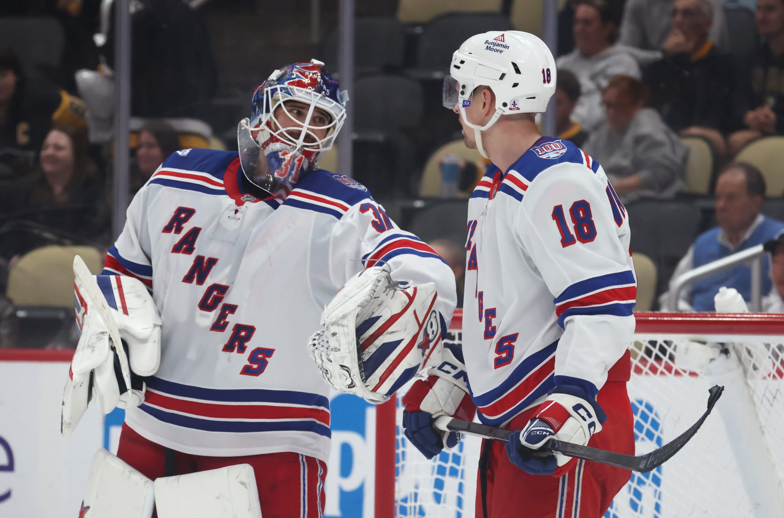 Oct 11, 2025; Pittsburgh, Pennsylvania, USA;  New York Rangers goaltender Igor Shesterkin (31) talks with defenseman Urho Vaakanainen (18) against the Pittsburgh Penguins during the third period at PPG Paints Arena. Mandatory Credit: Charles LeClaire-Imagn Images